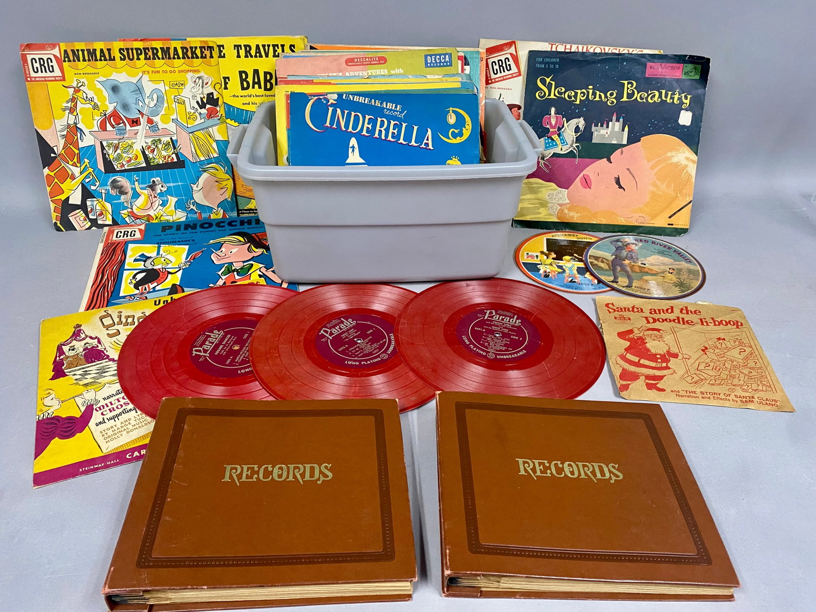 Vintage Childrens Phonograph Records: This is an extensive assortment of mid-20th-century children's phonograph records featuring 78 RPM, 45 RPM, and 6-inch formats. The collection includes a significant group of 10-inch records from the 