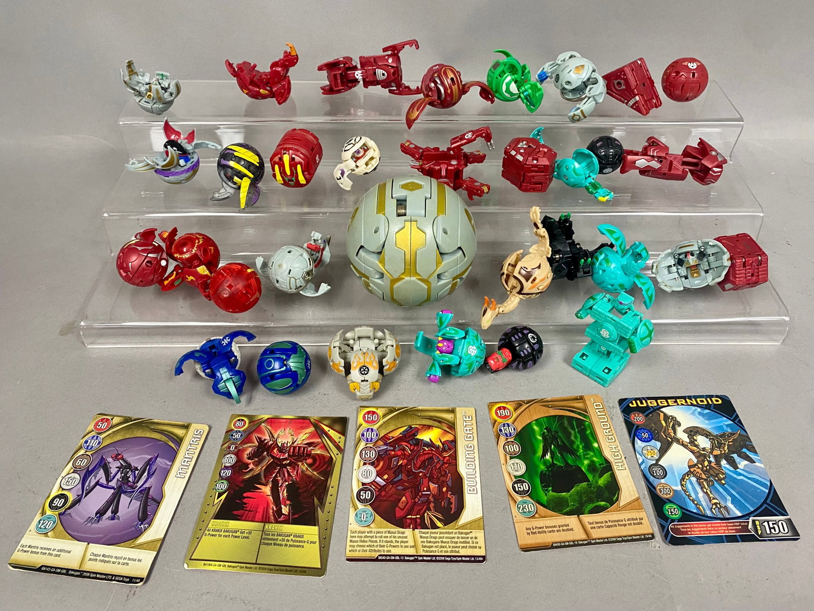 Bakugan Battle Brawlers Action Figures & Gate Cards: This collection consists of 33 Bakugan Battle Brawlers transforming action figures and five associated magnetic game cards, produced by Spin Master Ltd. and Sega Toys, circa 2008-2009. The lot feature