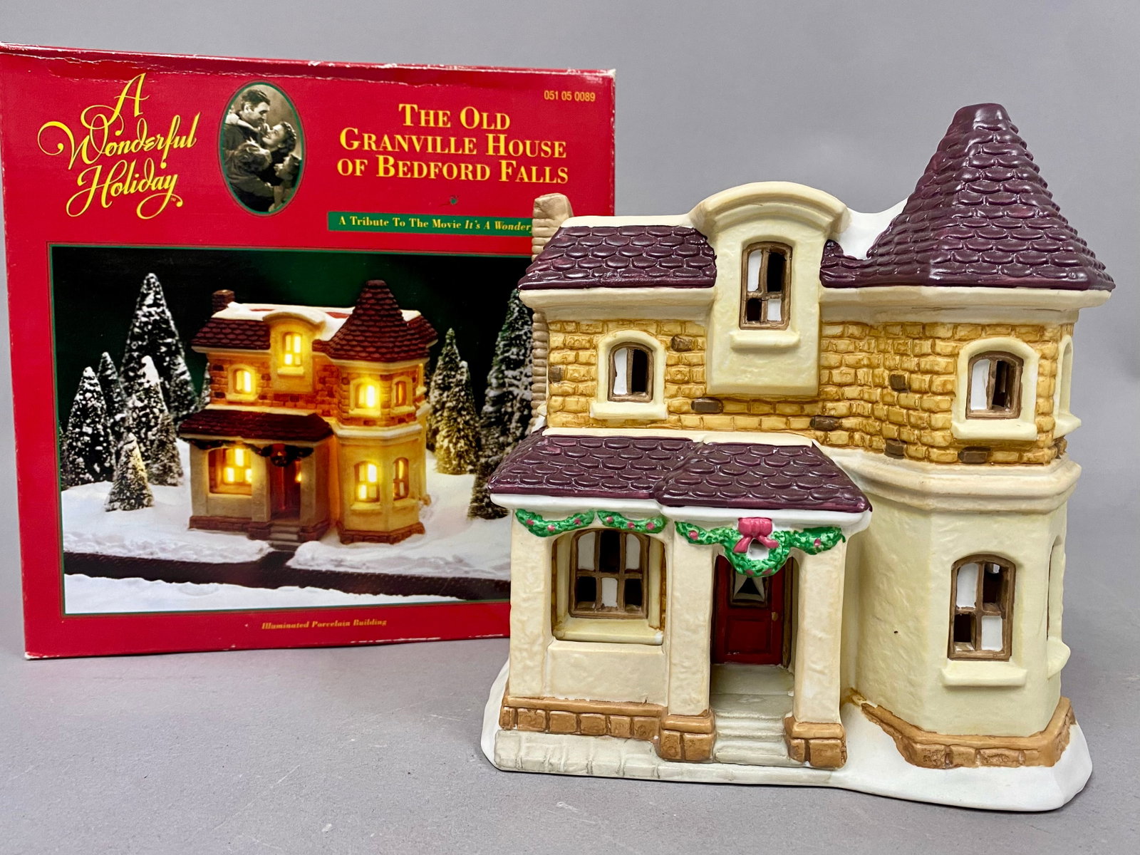 It's a Wonderful Life The Old Granville House Illuminated Porcelain Building: This illuminated hand-painted porcelain building is titled The Old Granville House of Bedford Falls, produced as part of A Wonderful Holiday Collection by DHC in 1994. The piece is a miniature