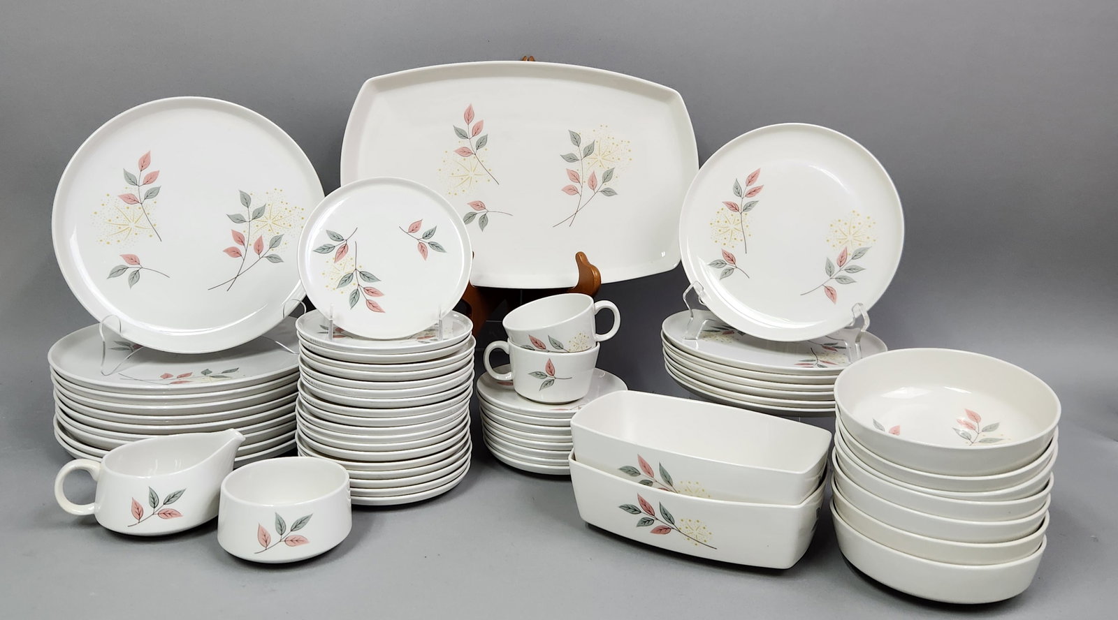 Franciscan Springsong Dinnerware: This set of ceramic dinnerware is from the Franciscan Family China line in the Springsong pattern, manufactured by Gladding, McBean and Company in the United States. The undersides of the items bear a