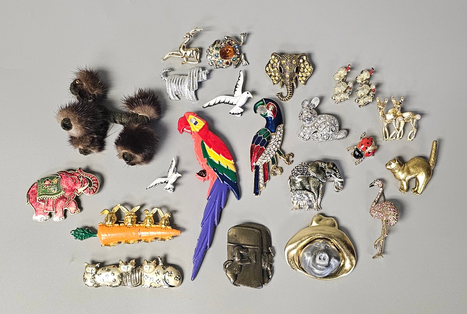 Costume Jewelry Animal Brooches Inc JJ & Napier: This collection of 21 figural brooches and pins features a diverse array of animal and whimsical motifs. Several pieces bear manufacturer marks including Jonette Jewelry Company (marked Â©JJ), Napie