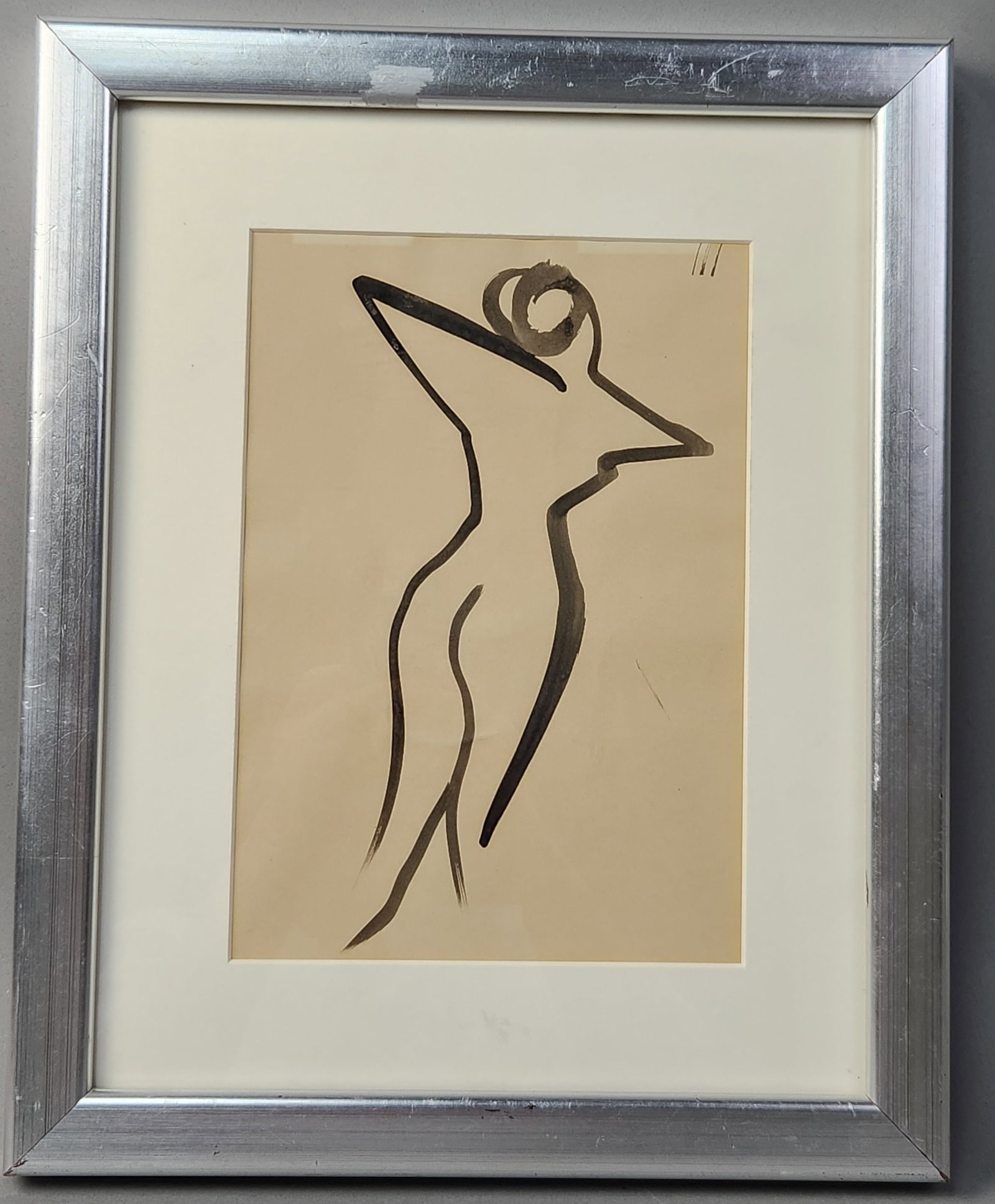 Anatoli Zverev Female Figure Ink on Paper: This minimalist ink drawing on toned paper depicts a gestural, abstracted female figure. Based on a typed identification label attached to the verso, the work is attributed to the Russian artist Anato