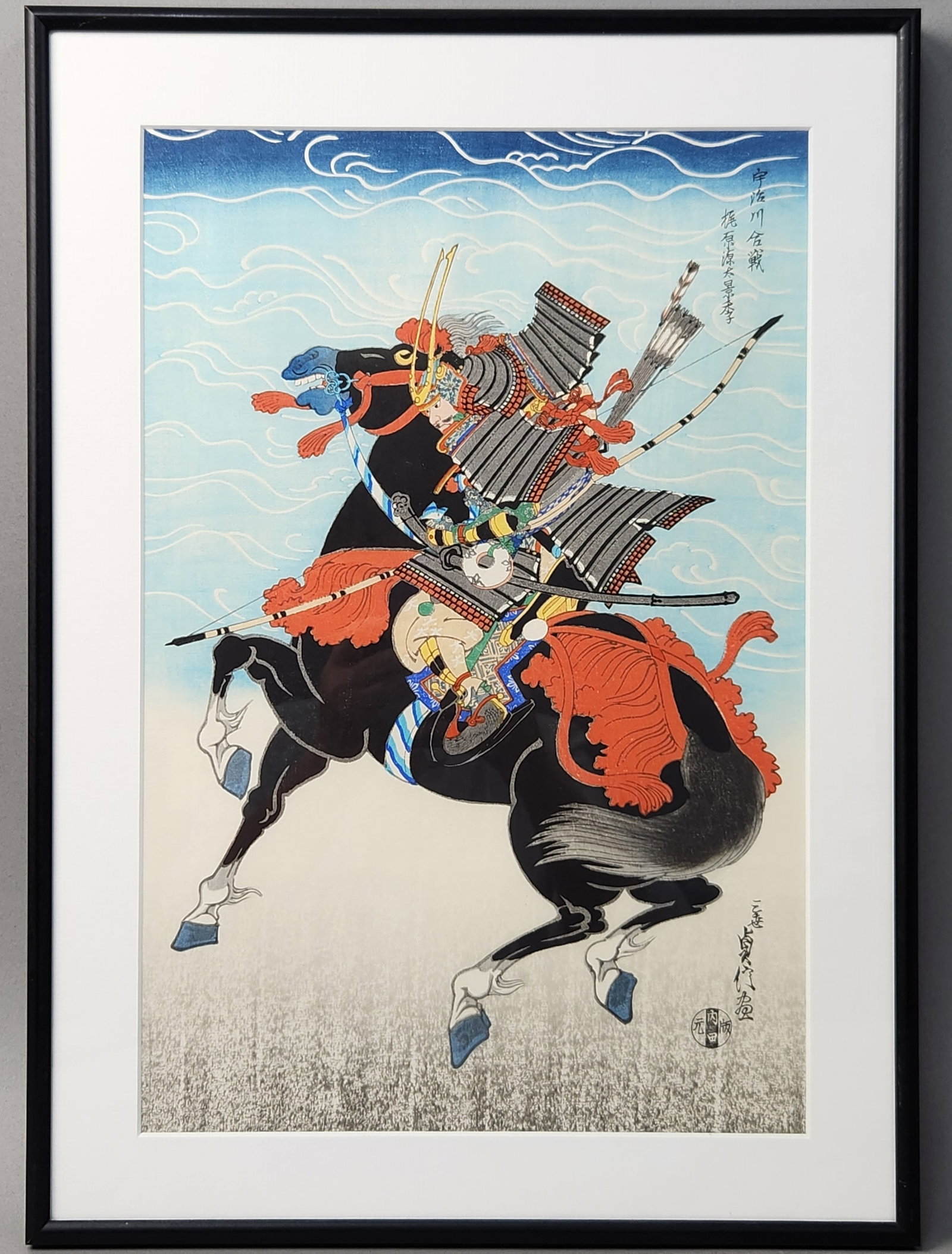 Warrior Kajiwara Kagesue Woodblock Print: A modern color woodblock print titled Warrior Kajiwara Kagesue, designed by artist Sadanobu Hasegawa III and published by the Uchida Art Co., Ltd. of Kyoto. The work illustrates the legendary samurai 