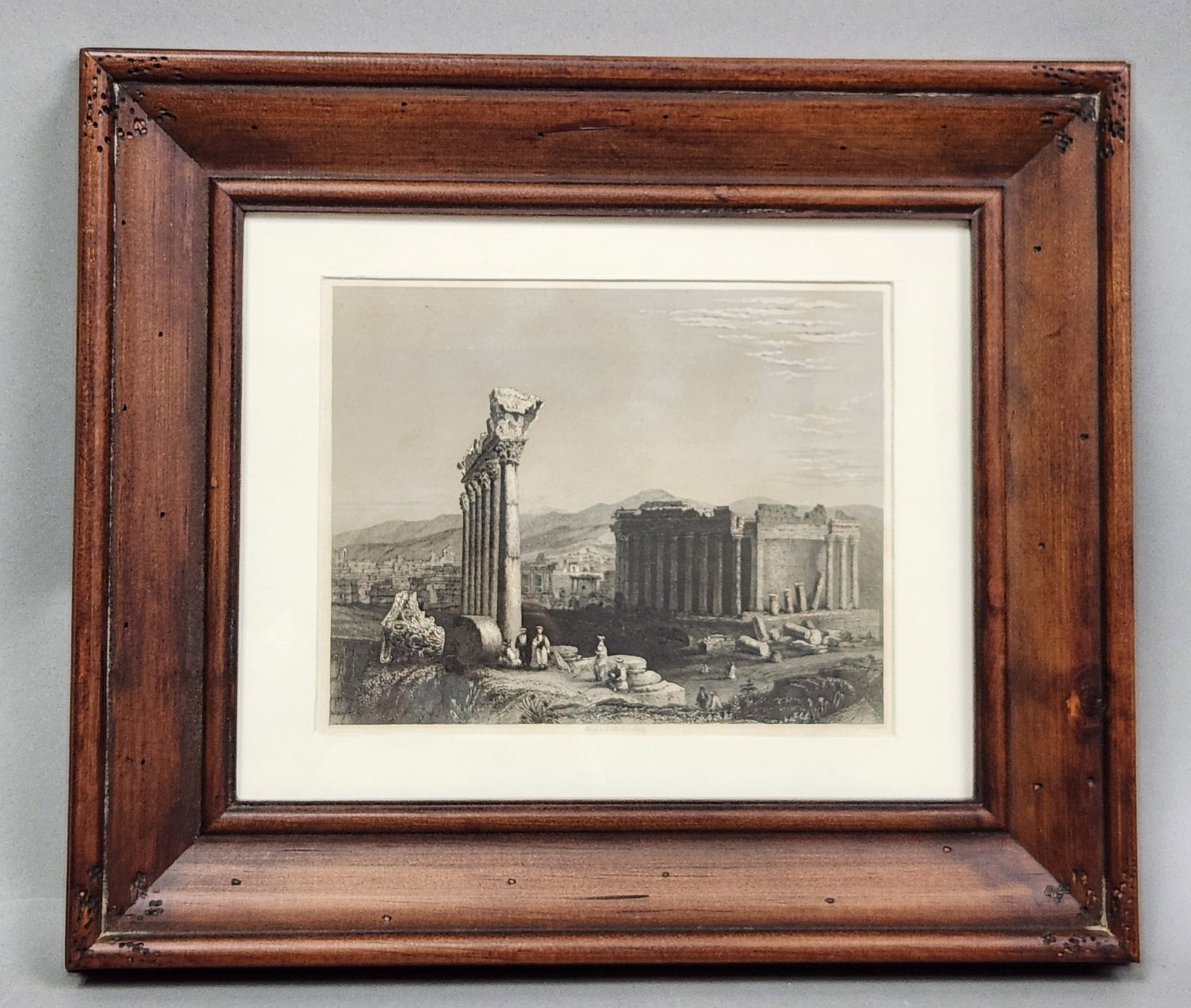 19th-Century Steel Engraving Ruins of Baalbek: This 19th-century steel engraving depicts the ancient Roman architectural ruins of Baalbek in modern-day Lebanon, after a drawing by the British artist William Henry Bartlett. The work displays the ch
