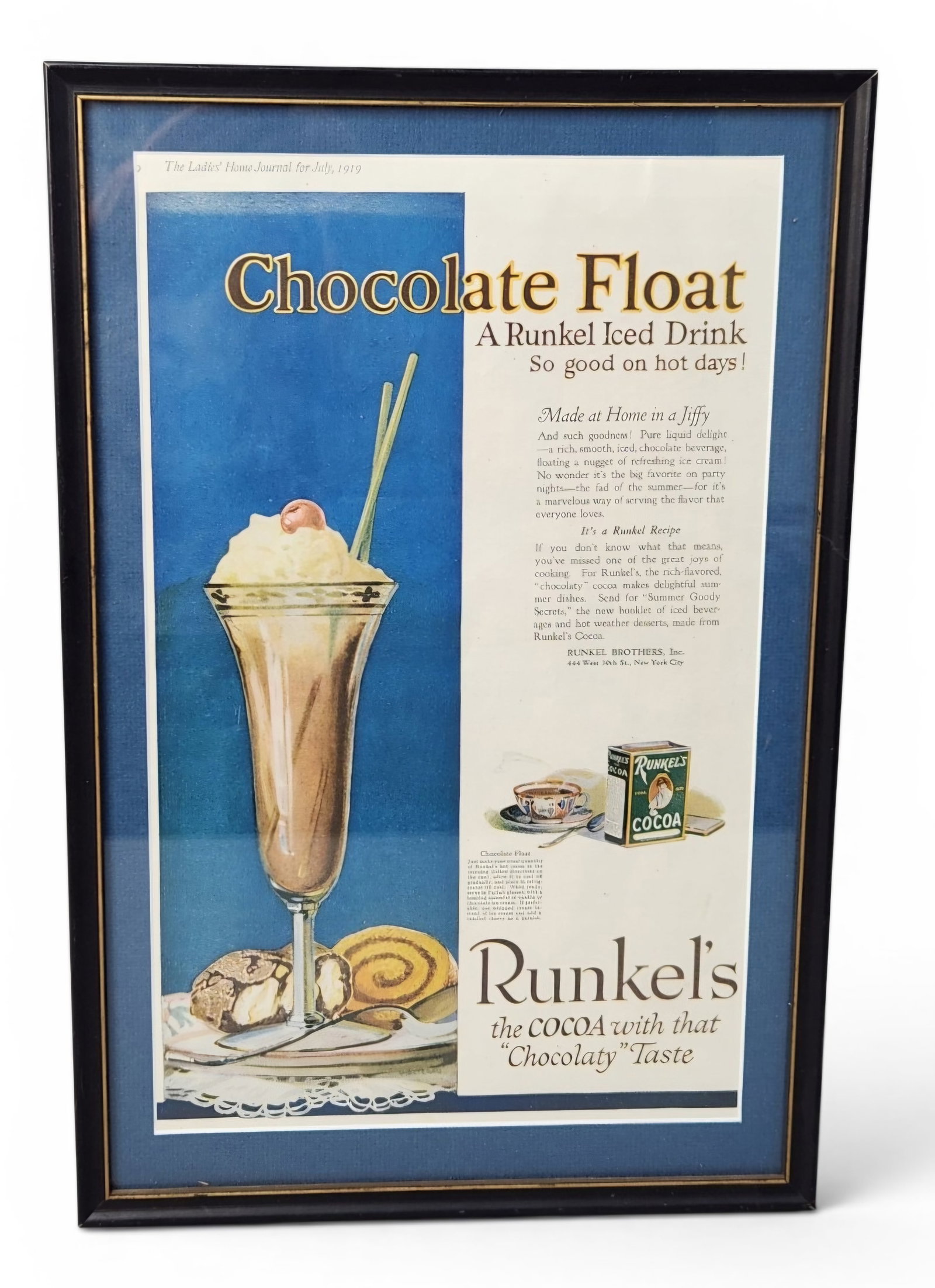 1919 Runkel's Cocoa Chocolate Float Ad: This is an original vintage magazine advertisement for Runkel Brothers, Inc., specifically promoting Runkel's Cocoa. The advertisement was originally published in the July 1919 issue of The Ladies'