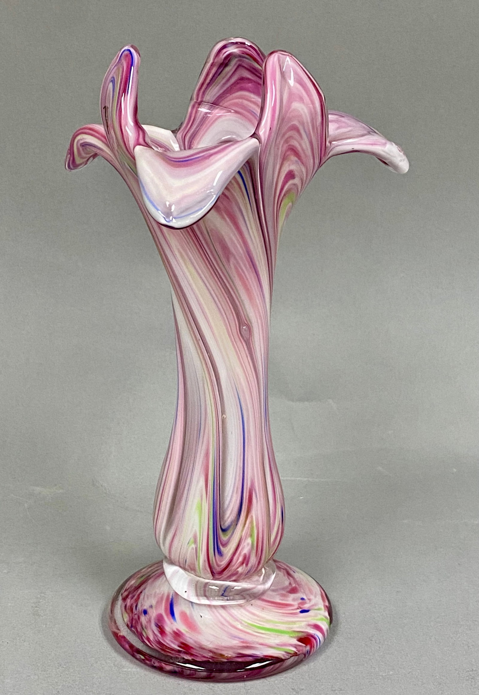 Jack-in-the-Pulpit Vase: A hand-blown art glass vase crafted in a Murano style. The piece features a flared, undulating rim with five points, resembling a Jack-in-the-Pulpit or lily blossom. The body is characterized by a mar