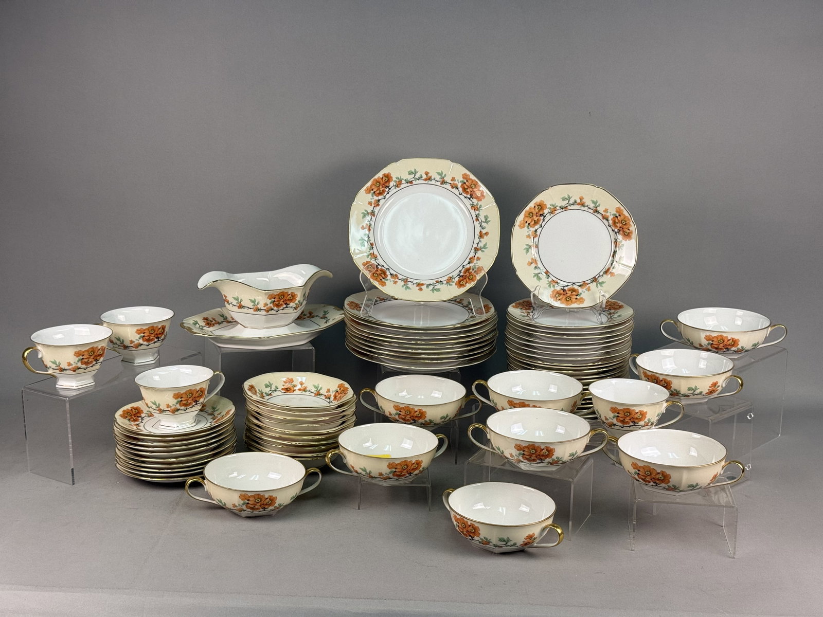 Epiag Czechoslovakian Porcelain Dinner Service: A large porcelain dinner service manufactured by Epiag in Czechoslovakia, specifically at the Stara Role (Altrohlau) factory. The set features pattern number 7213, decorated with trailing branches of