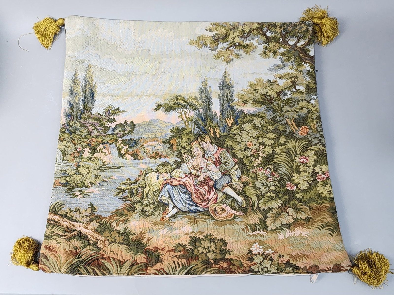 Rococo Style Woven Tapestry Pillow Cover: A machine-woven tapestry-style cushion cover featuring two different pastoral f??te galante scenes in the 18th-century Rococo style. Width: 19.5 inches. The cover is in good overall condition. Minor