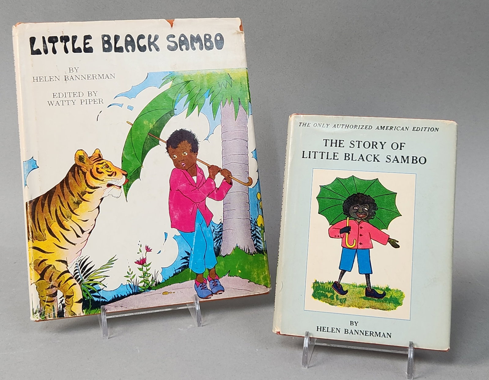 Little Black Sambo Books By Helen Bannerman: This lot features two distinct hardcover editions of the children's classic by Helen Bannerman. The first volume is a large-format edition published by Platt & Munk Publishers, a Division of Questor E