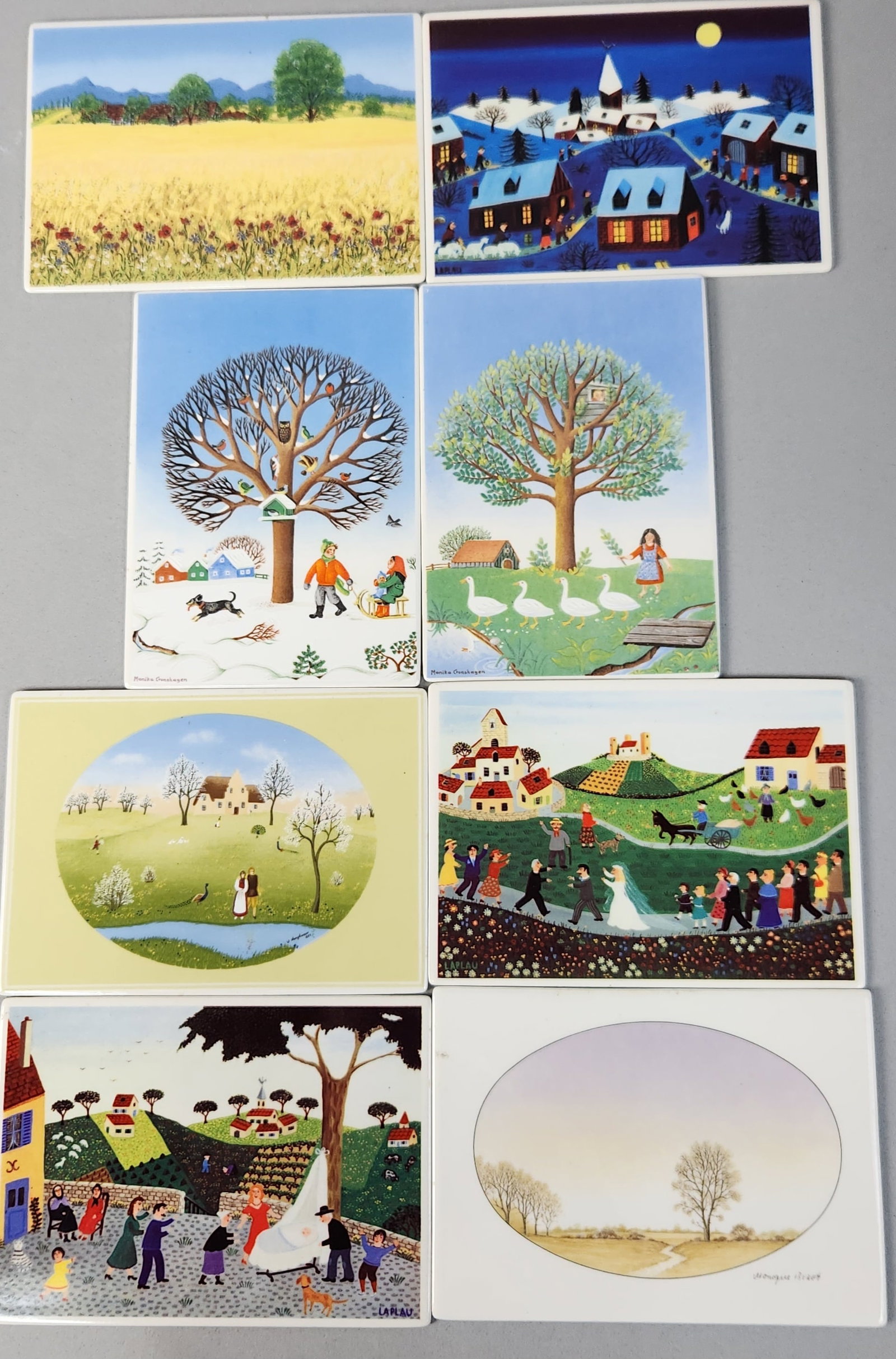 Villeroy & Boch VilboCard Wall Plaques: This group consists of eight porcelain wall plaques produced by Villeroy and Boch in West Germany. These items, identified as VilboCards and CeramCards, feature naive folk art illustrations by several
