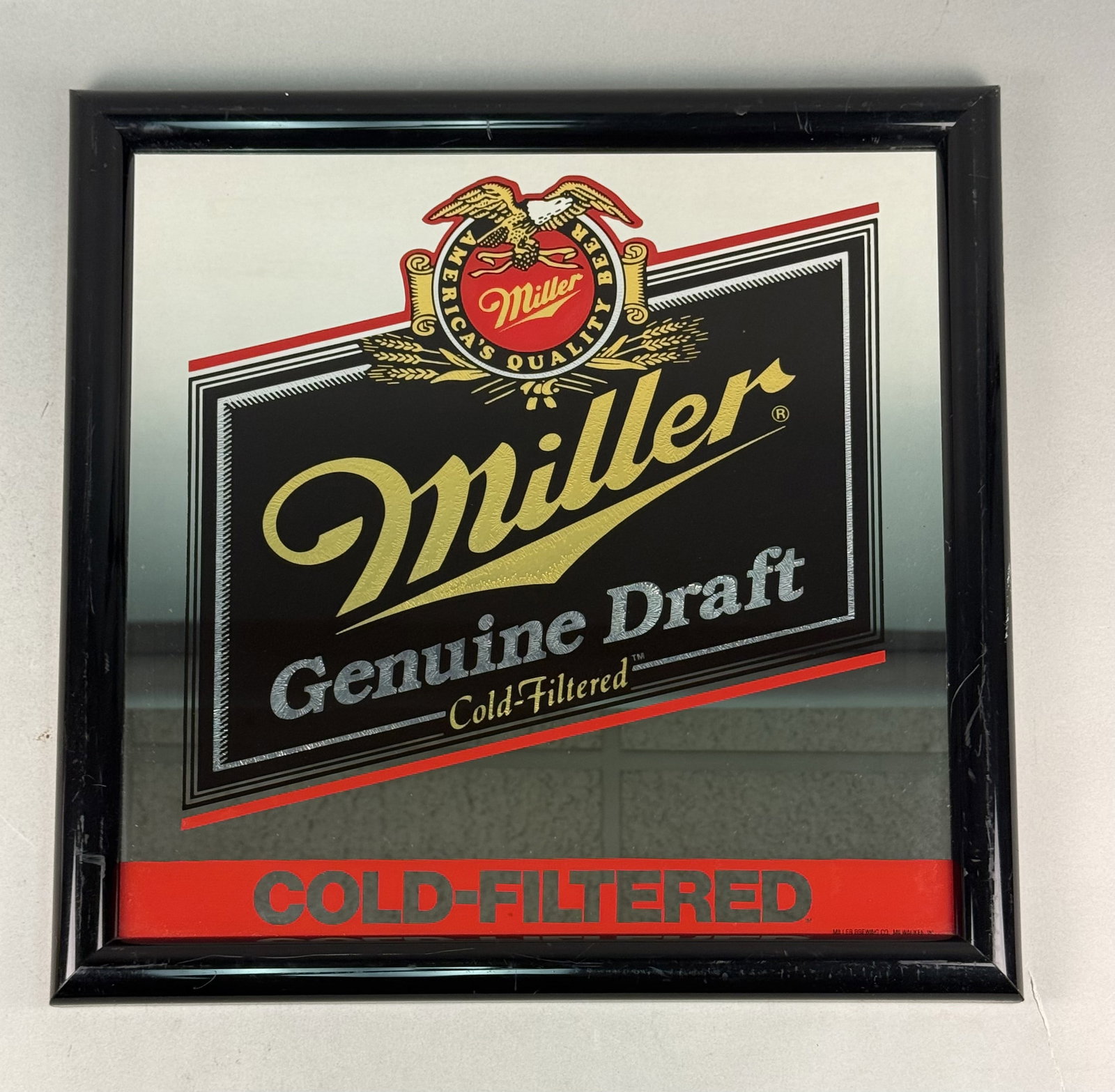 Vintage Miller Genuine Draft Bar Mirror: This is a square promotional bar mirror produced for the Miller Brewing Company to advertise Miller Genuine Draft. The mirror features multi-colored screen-printed graphics on the glass surface. The d