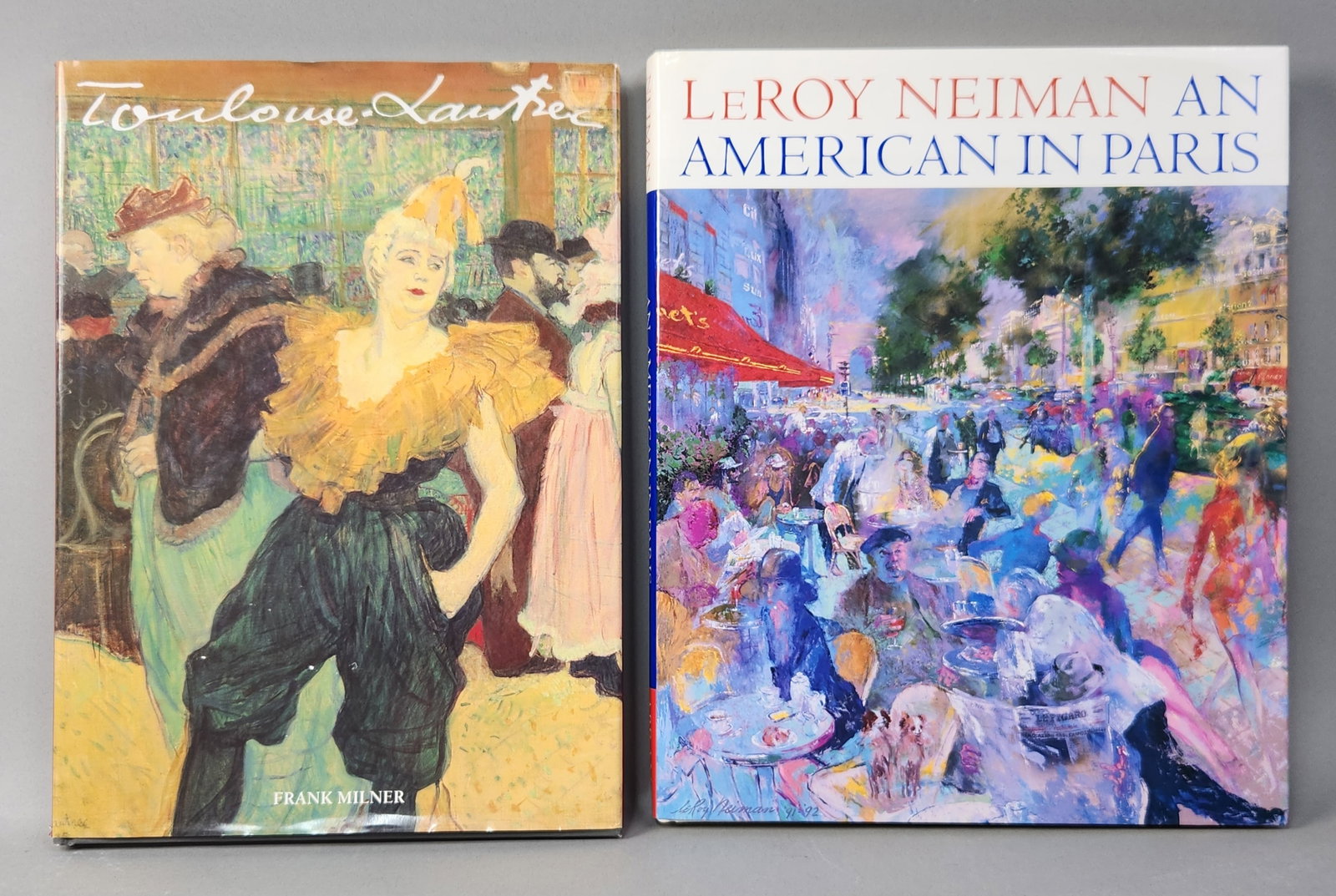 Two Art Hardcover Books: This lot features two large-format hardcover art monographs with pictorial dust jackets focusing on French art and culture. The first volume is titled Toulouse-Lautrec by Frank Milner, published in 19