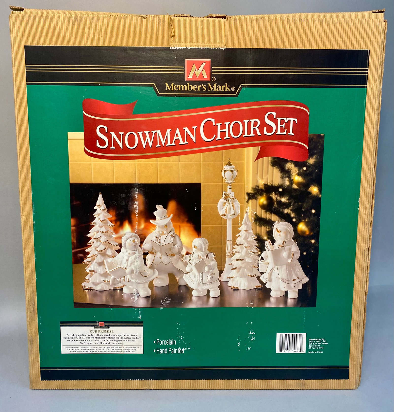 Porcelain Snowman Choir Set: A Member's Mark hand-painted porcelain Snowman Choir Set. This collection consists of seven pieces, including four snowman figurines depicted in singing poses, two tiered evergreen trees with