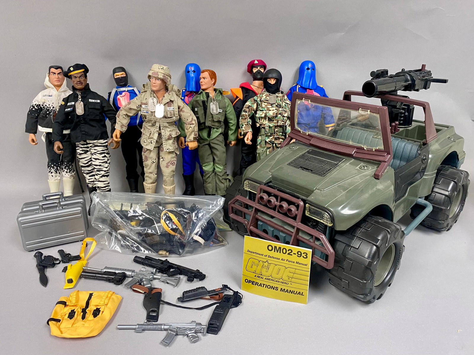 9 G.I. Joe 12-Inch Action Figures, Vehicle & Accessories: A large collection of G.I. Joe A Real American Hero toys manufactured by Hasbro in the early 1990s. The lot includes nine 12-inch scale action figures from the Hall of Fame and related series, featuri