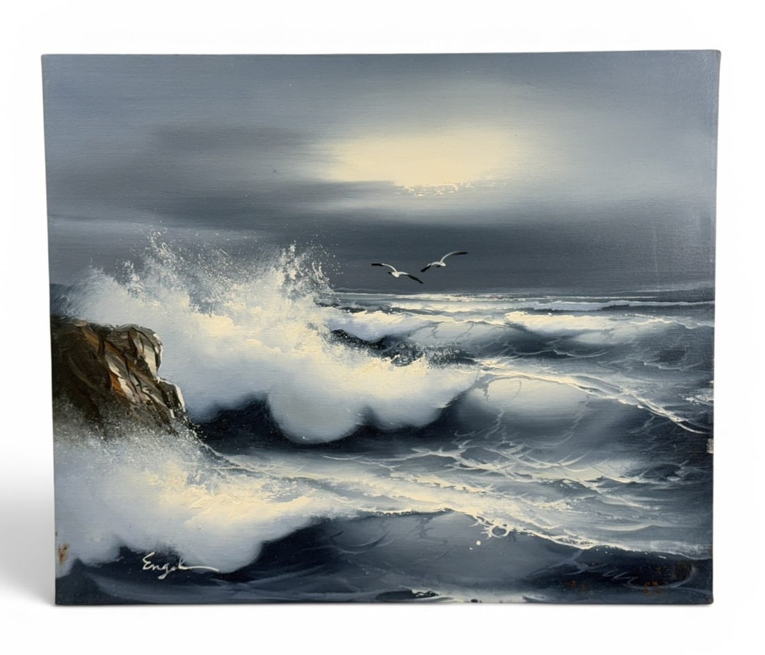 Seascape Oil on Canvas, Signed Engel: This representational seascape painting on canvas depicts a dramatic coastal scene with white-capped waves crashing against a dark rocky outcrop. The work features textured brushwork and impasto highl
