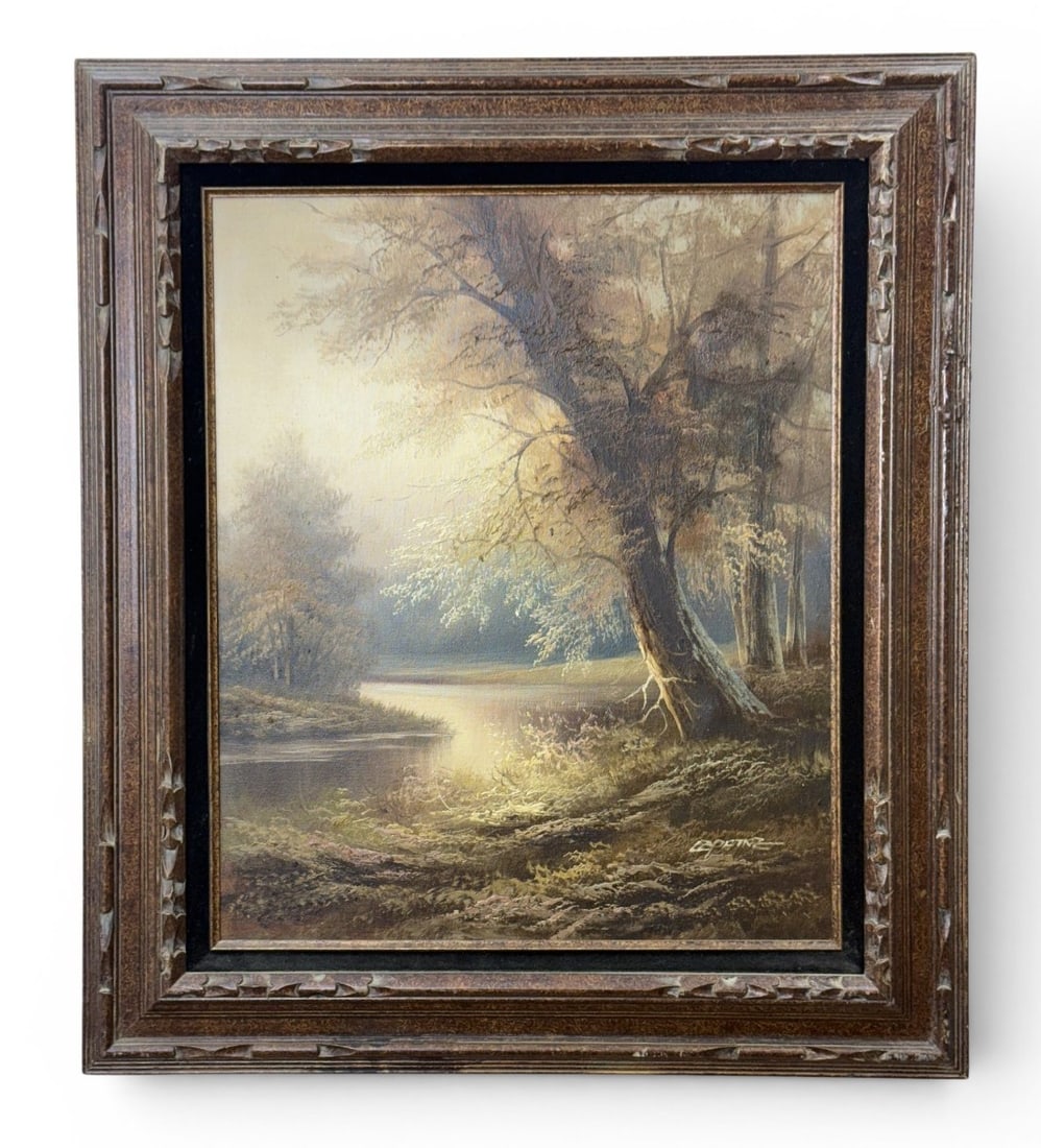 Signed Cortez Atmospheric River Landscape Oil on Canvas: This atmospheric landscape painting is executed in oil on canvas, featuring a river or lake scene under a soft, hazy light characteristic of mid-to-late 20th-century decorative works. The work is sign