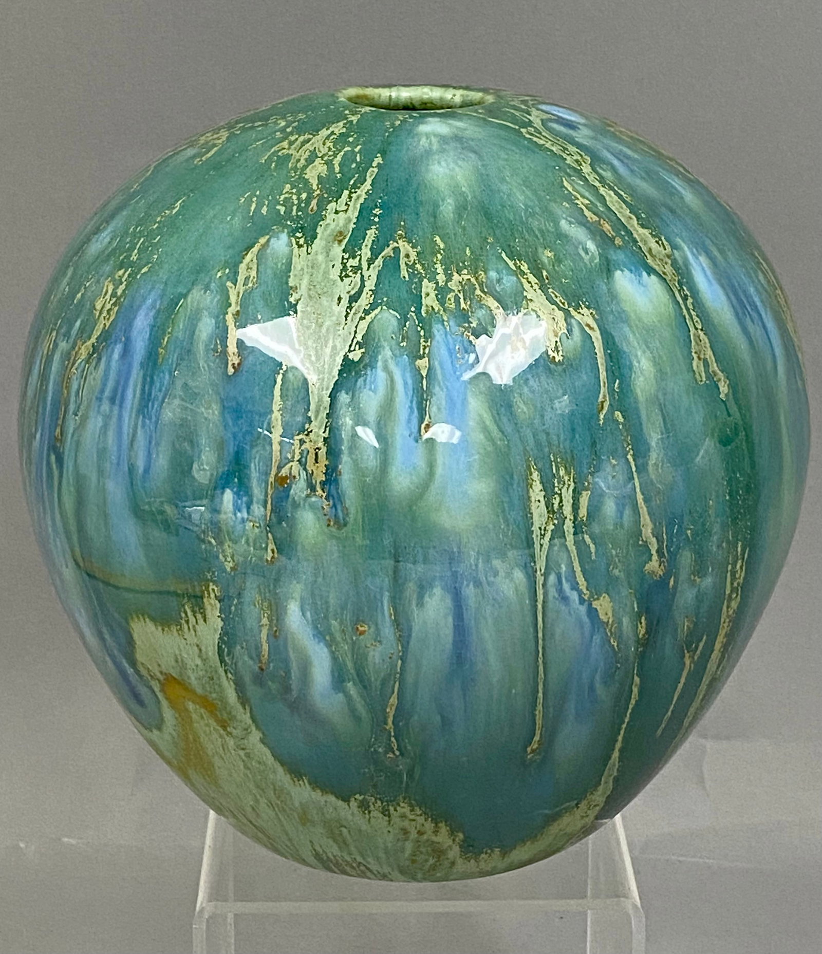 Monterey Jade USA Drip Glazed Ceramic Globular Vase: 1960s California studio pottery features a heavily applied reactive drip glaze, the colors shift between seafoam green, ocean blue, and creamy tan, giving the piece the "jade" appearance the maker was