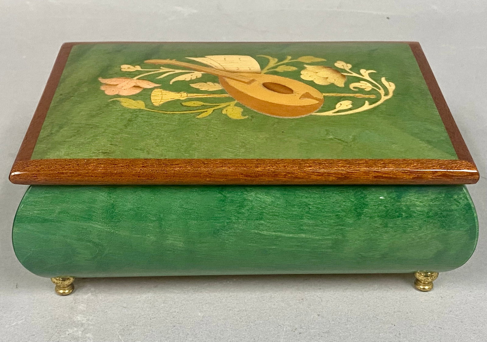 Vintage Italian Inlaid Wooden Music Box: Made in Sorrento, Italy. The marquetry is intricate, with several different types of wood to create the detailed mandolin scene. The music is "Torna a Surriento" (Come Back to Sorrento) composed in 19