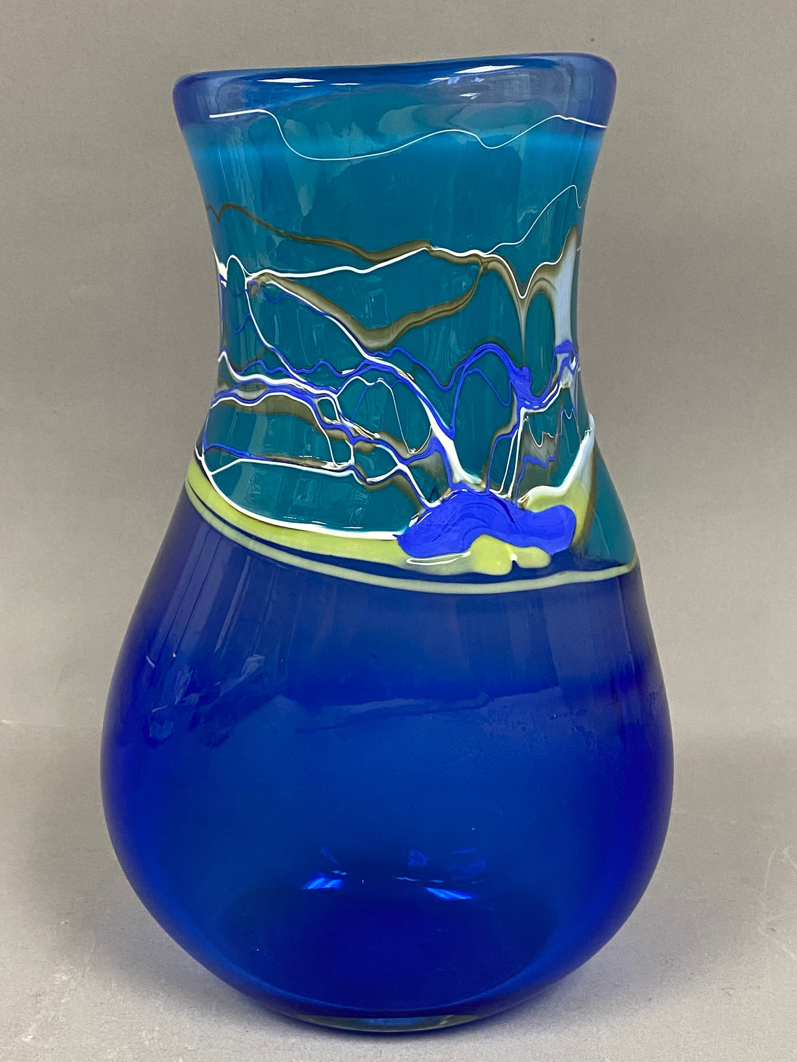 Sharon Kasha Earthglass Arts Signed Hand-Blown Art Glass Landscape Vase 1994: This hand-blown art glass vase was produced by artist Sharon Kasha for Earthglass Arts. The vessel features a bulbous lower body that tapers into a narrowed neck before flaring at the rim. The piece