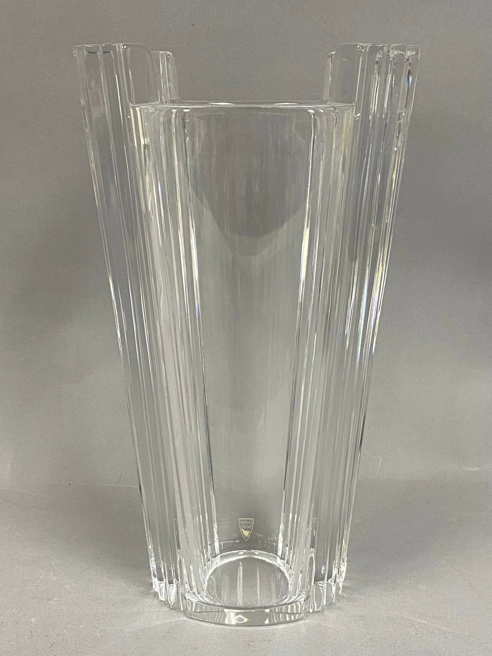 Orrefors Olle Alberius Castle Top Fluted Crystal Vase: A tall clear lead crystal vase designed by Olle Alberius for Orrefors. The vessel features a tapering cylindrical form with deep vertical fluting. The design is distinguished by its crenelated or
