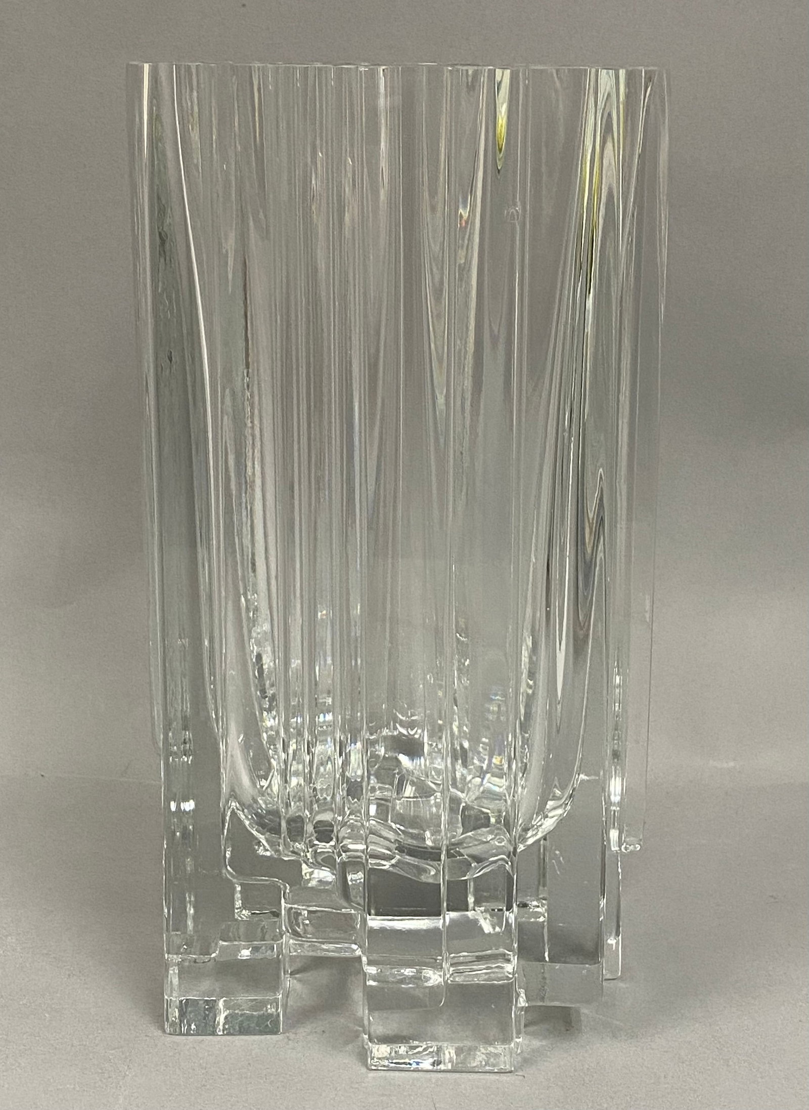 Tapio Wirkkala for Iittala Arcadia Art Glass Vase, Model 3571: An Iittala Arcadia model 3571 clear glass vase designed by Tapio Wirkkala. This mid-century modern vessel features a rectangular architectural form with prominent vertical ridges and an ice-like