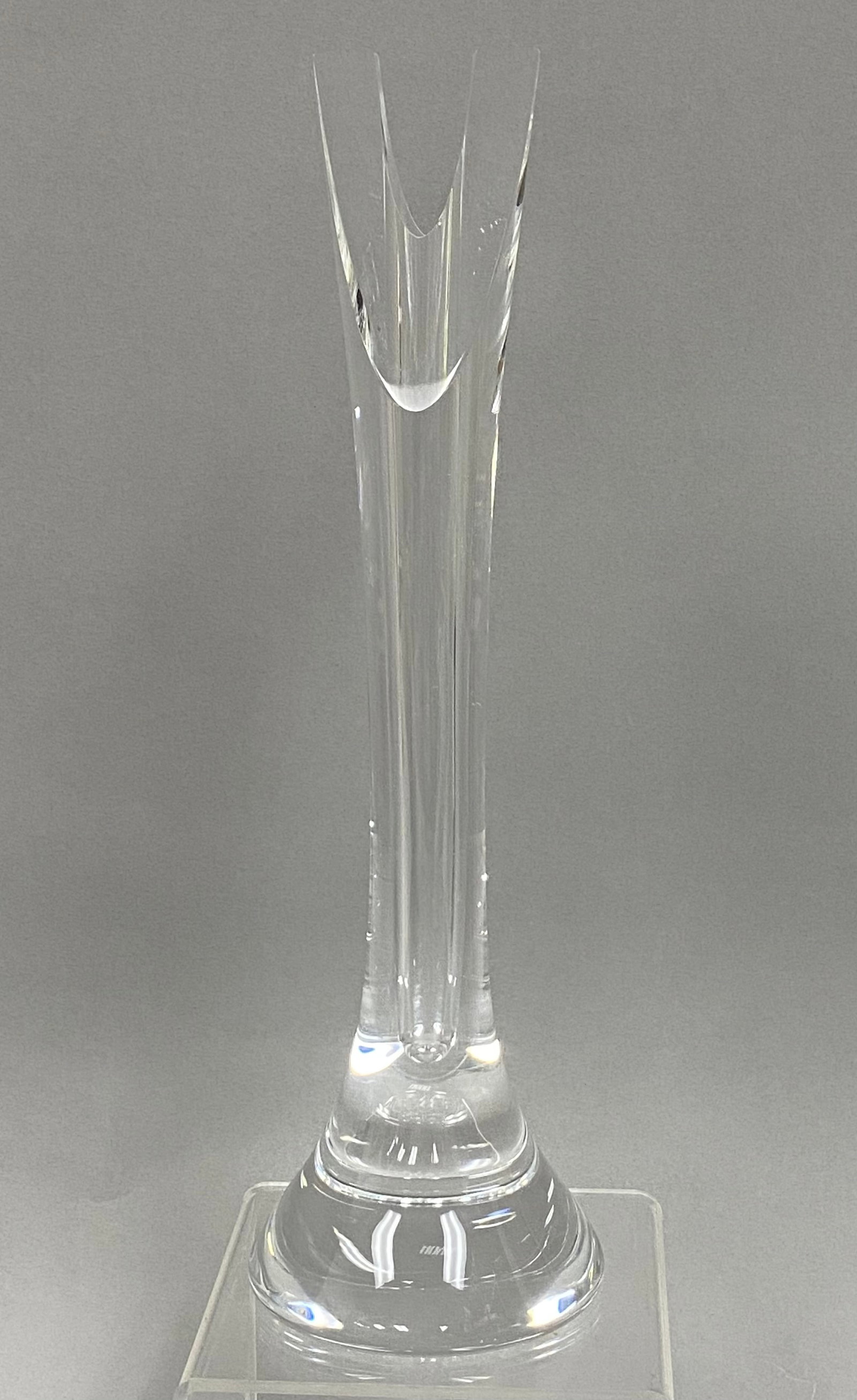 Signed Hoya Japan Art Crystal 'Tension' Vase: By Toshio Sugasawa, this investment-grade modernist Japanese art glass is an authentic Hoya Crystal "Tension" series sculptural bud vase that stands 10 inches tall. It features a heavy, thick-walled