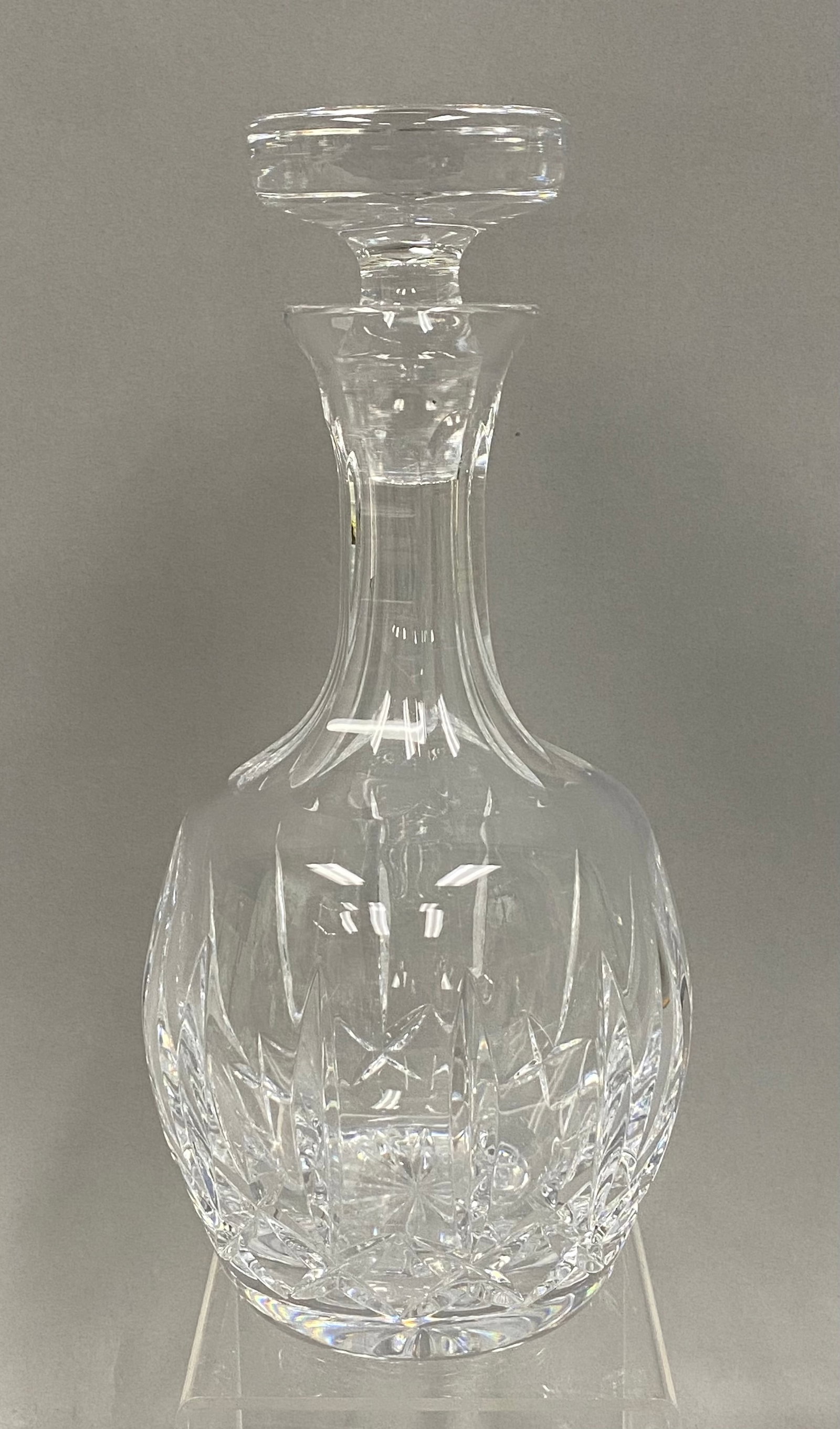 Vintage H. Atlantis Lead Crystal Diamond Cut Decanter: Atlantis Crystal is made in Portugal. Measuring 10.5 inches tall with the stopper. Excellent Condition with no chips, cracks nor cloudiness. Stopper fits securely. acid-etched/signed "Atlantis" on