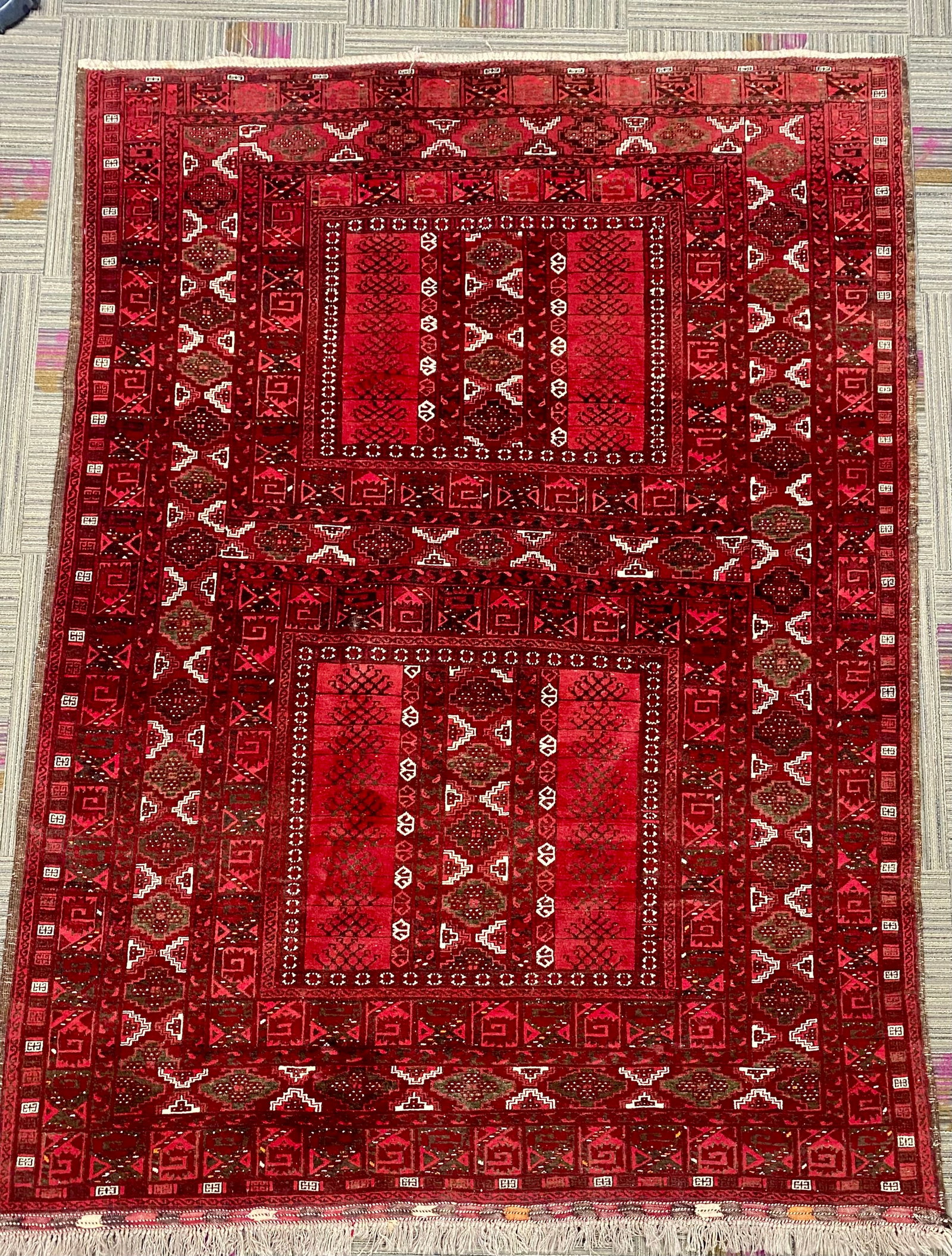 Vintage Hand-Knotted Afghan Turkoman Rug: Mid-to-late 20th Century Afghan Turkoman / Bokhara style Door of the Tent hand-knotted wool rug. This rug features a distinct dual-panel compartmentalized design, giving it a unique architectural