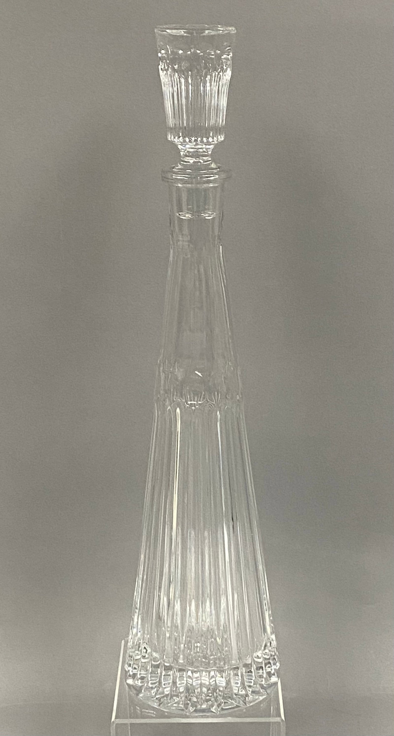 Fifth Avenue Bracelet Crystal Decanter: Fifth Avenue lead crystal decanter in the Bracelet pattern featuring a tall conical body decorated with vertical miter cuts and a central band of interlocking geometric diamond facets. The matching