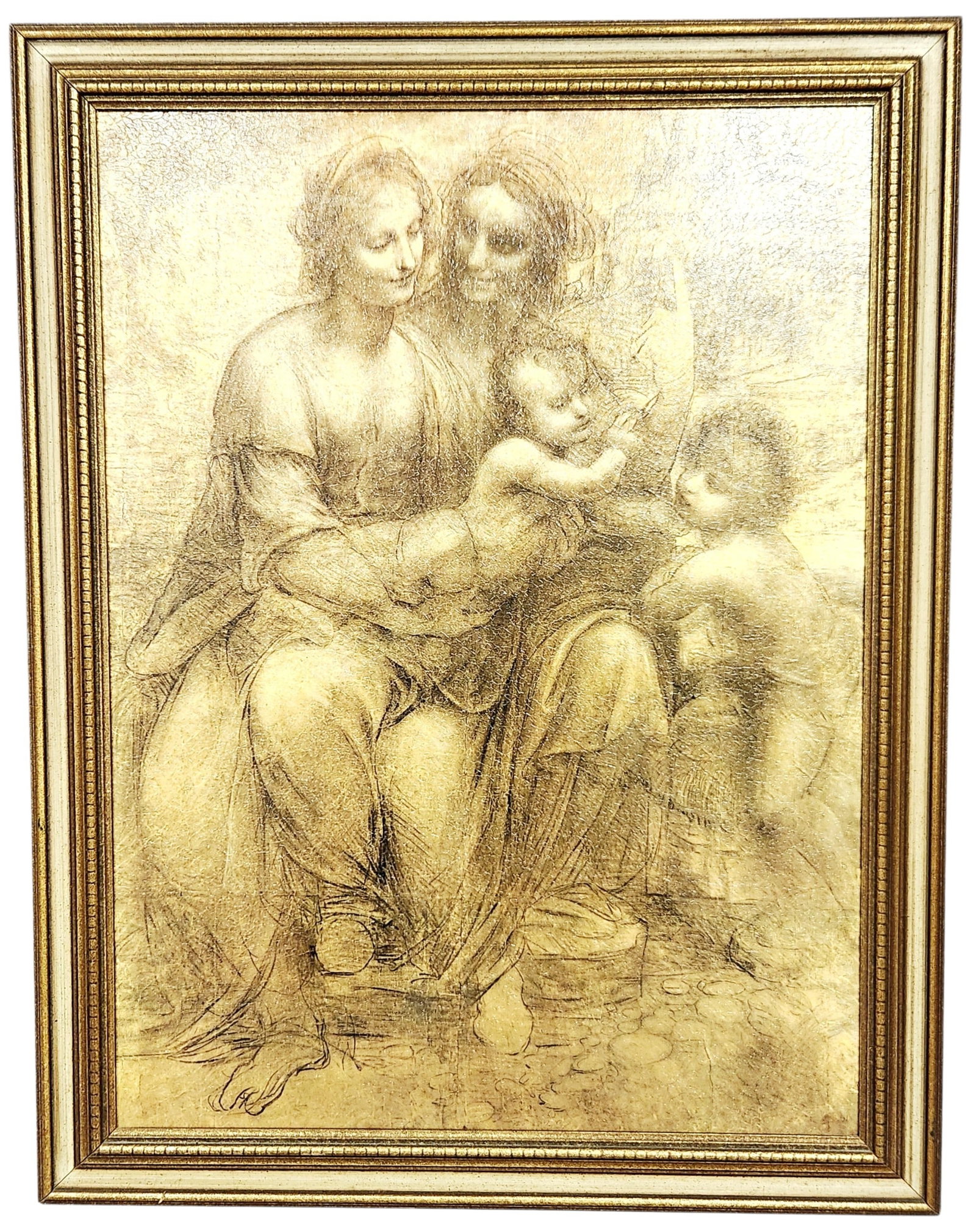 Leonardo da Vinci Reproduction Print: This lot features a framed reproduction print of the charcoal cartoon titled The Virgin and Child with Saint Anne and Saint John the Baptist by Leonardo da Vinci. the print is finished with a