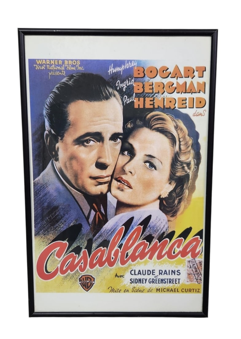 Casablanca French Movie Poster: A framed French-language commercial reproduction poster for the 1942 film Casablanca starring Humphrey Bogart and Ingrid Bergman. This piece measures approximately 17 by 11 inches. Good vintage