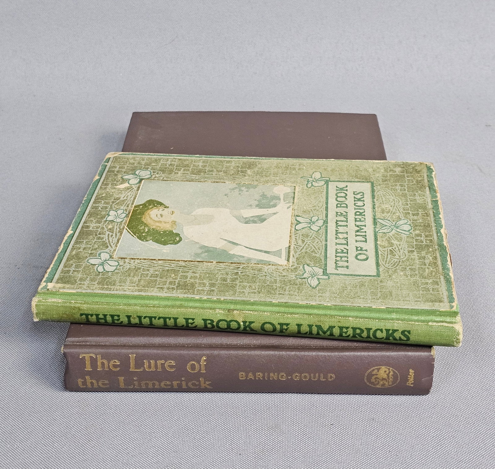 Pair of Limerick Books: This lot includes a 1910 edition of The Little Book of Limericks by Wallace and Frances Rice and a 1969 seventh printing of The Lure of the Limerick by William S. Baring-Gould. The earlier volume