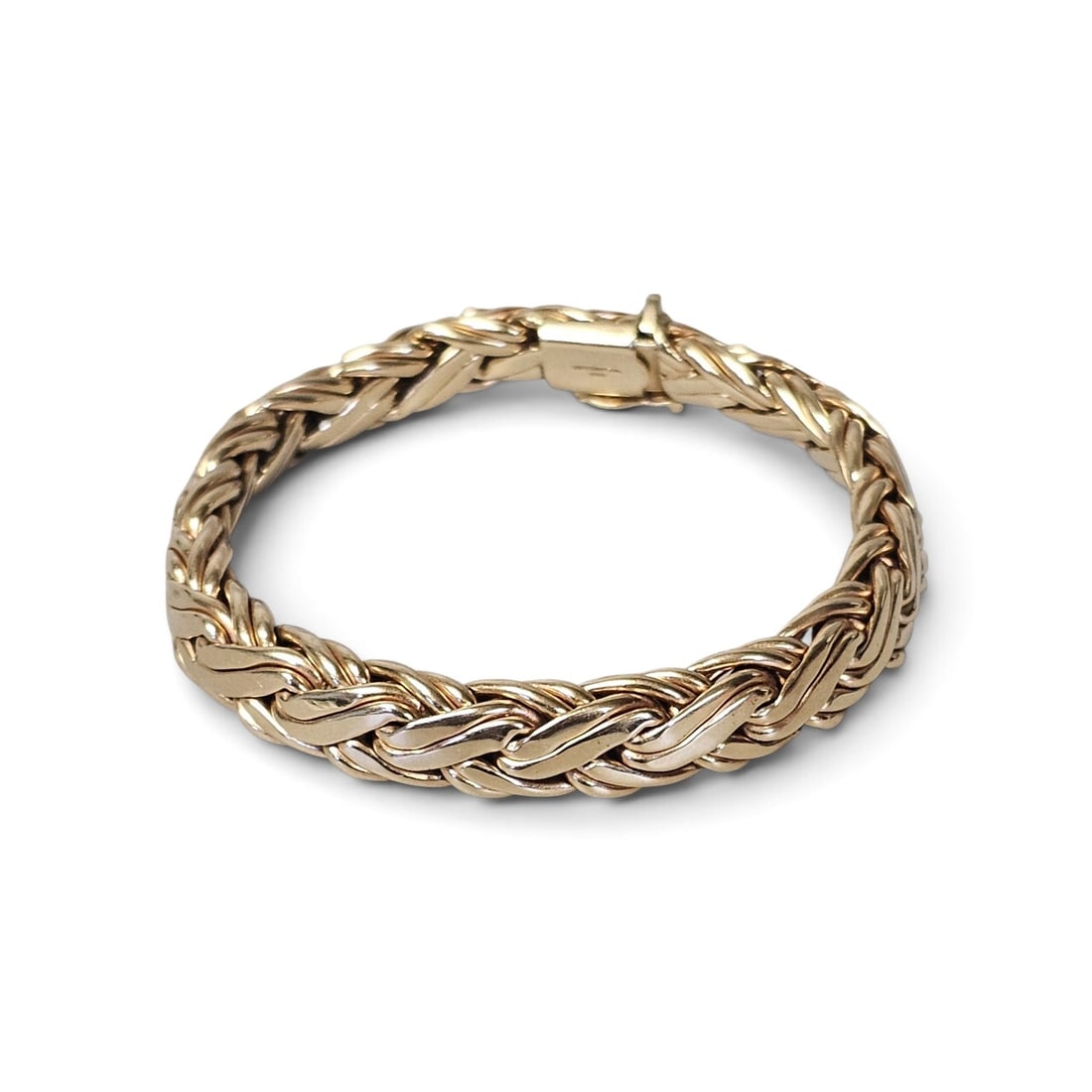 Tiffany & Co. 14K Gold Bracelet 24.0 Grams: This substantial 14 karat yellow gold bracelet features a classic three-strand woven link design and is stamped with the Tiffany & Co. maker's mark and "585" fineness on the clasp. The piece weighs 24