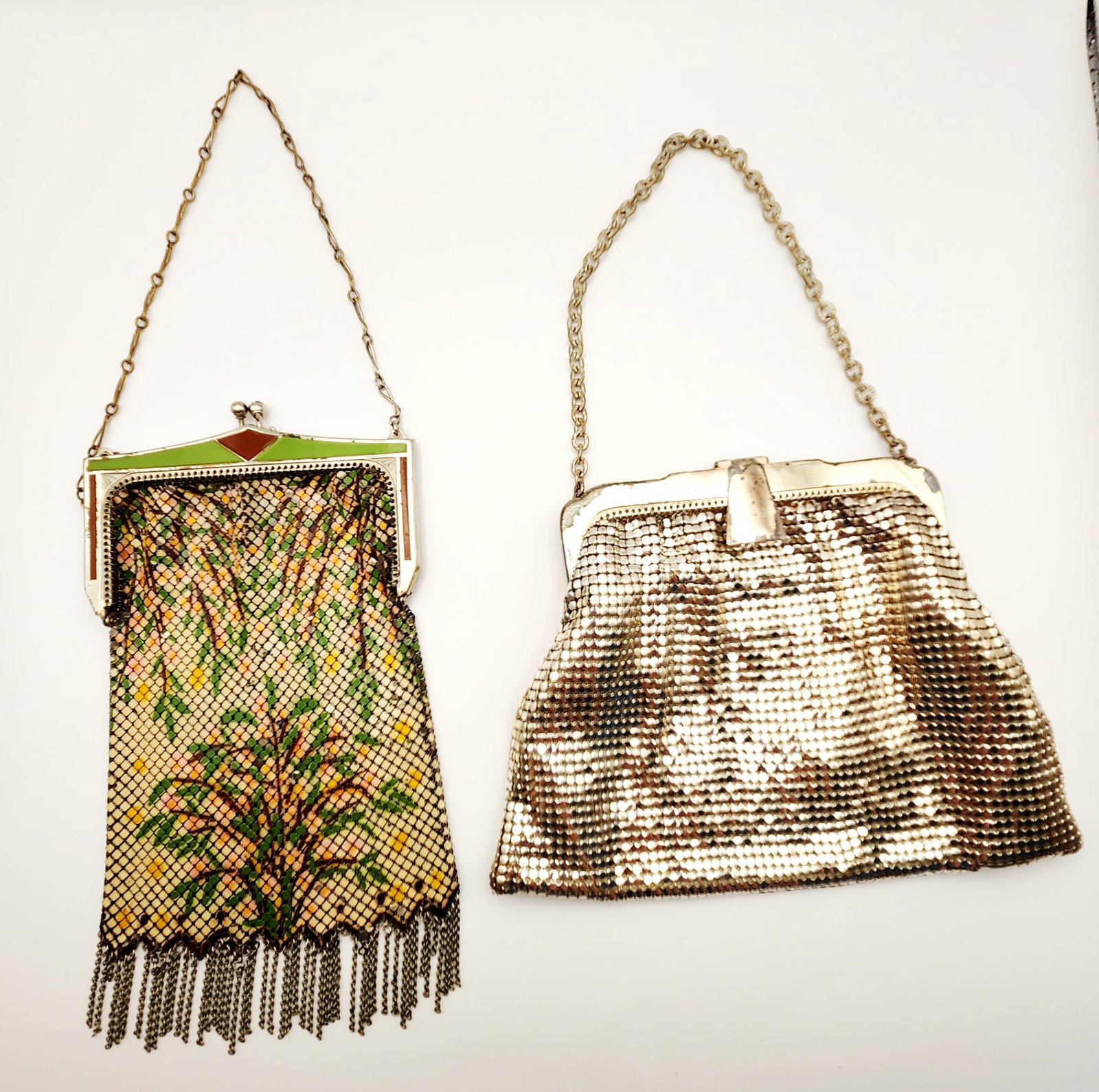 Whiting & Davis Mesh Purses: Two Whiting & Davis Co mesh evening purses, including one Art Deco painted mesh bag with chain fringe and one mid-century gold-tone armor mesh clutch. Item 1: length 7.5 inches Item 2: 6.5 x 5