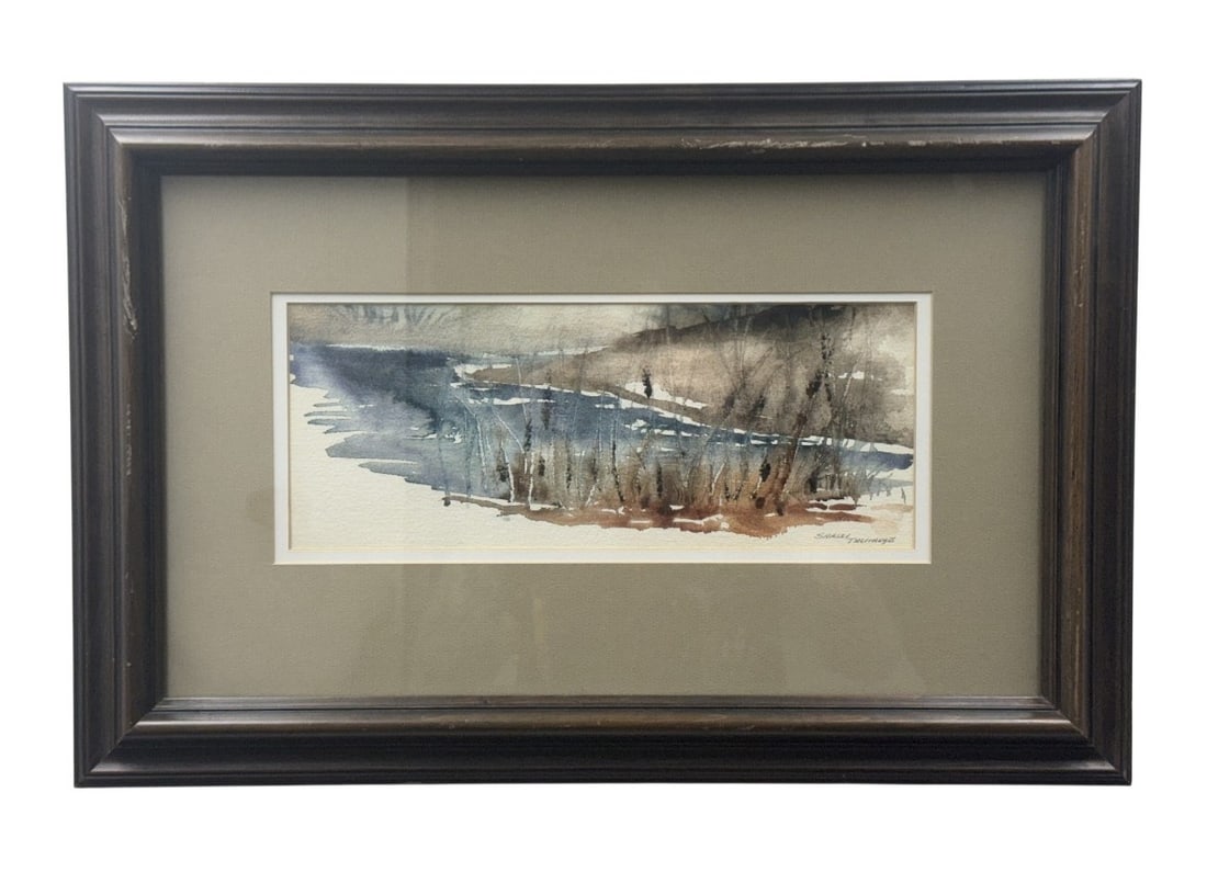 Shirley Talmadge Winter Landscape Watercolor: This modernist watercolor on textured paper by Shirley Talmadge depicts a wintry shoreline with vertical reeds and bare trees. The composition utilizes wet-on-wet washes in muted blues and grays