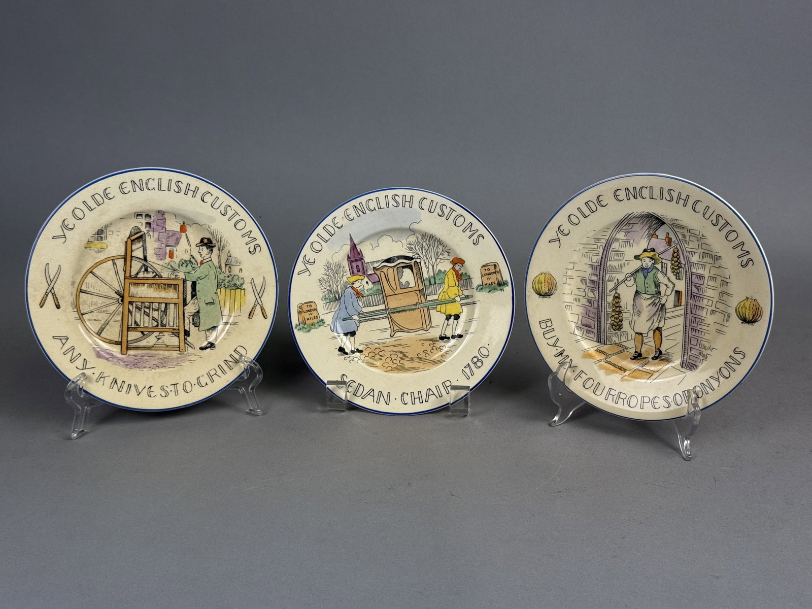 Three Burleigh English Customs Plates: A trio of earthenware cabinet plates produced by Burgess & Leigh Ltd of Staffordshire for Fondeville. Each plate features a transfer-printed scene from the Scenes of Olde English Customs series with