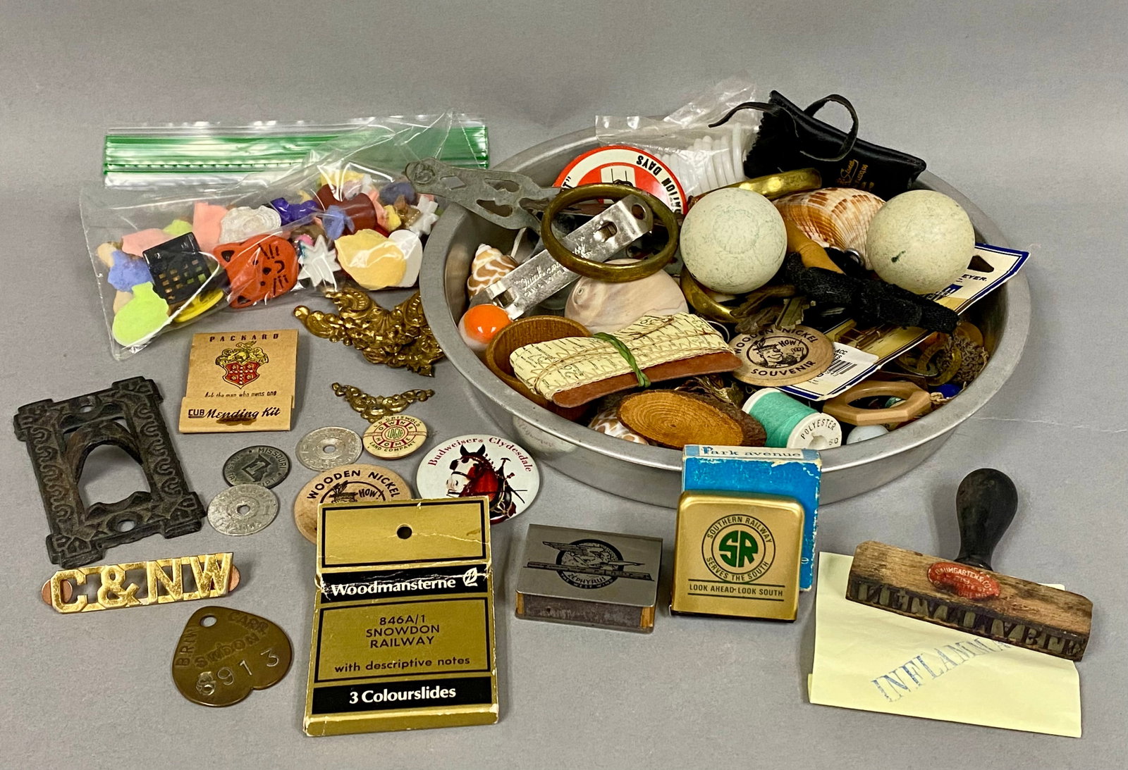 Collection of Vintage Railroad and Advertising: An assortment of vintage collectibles featuring a 1934 Burlington Zephyr stainless steel commemorative box and Southern Railway promotional items. The lot includes a brass Chicago and North Western Ra