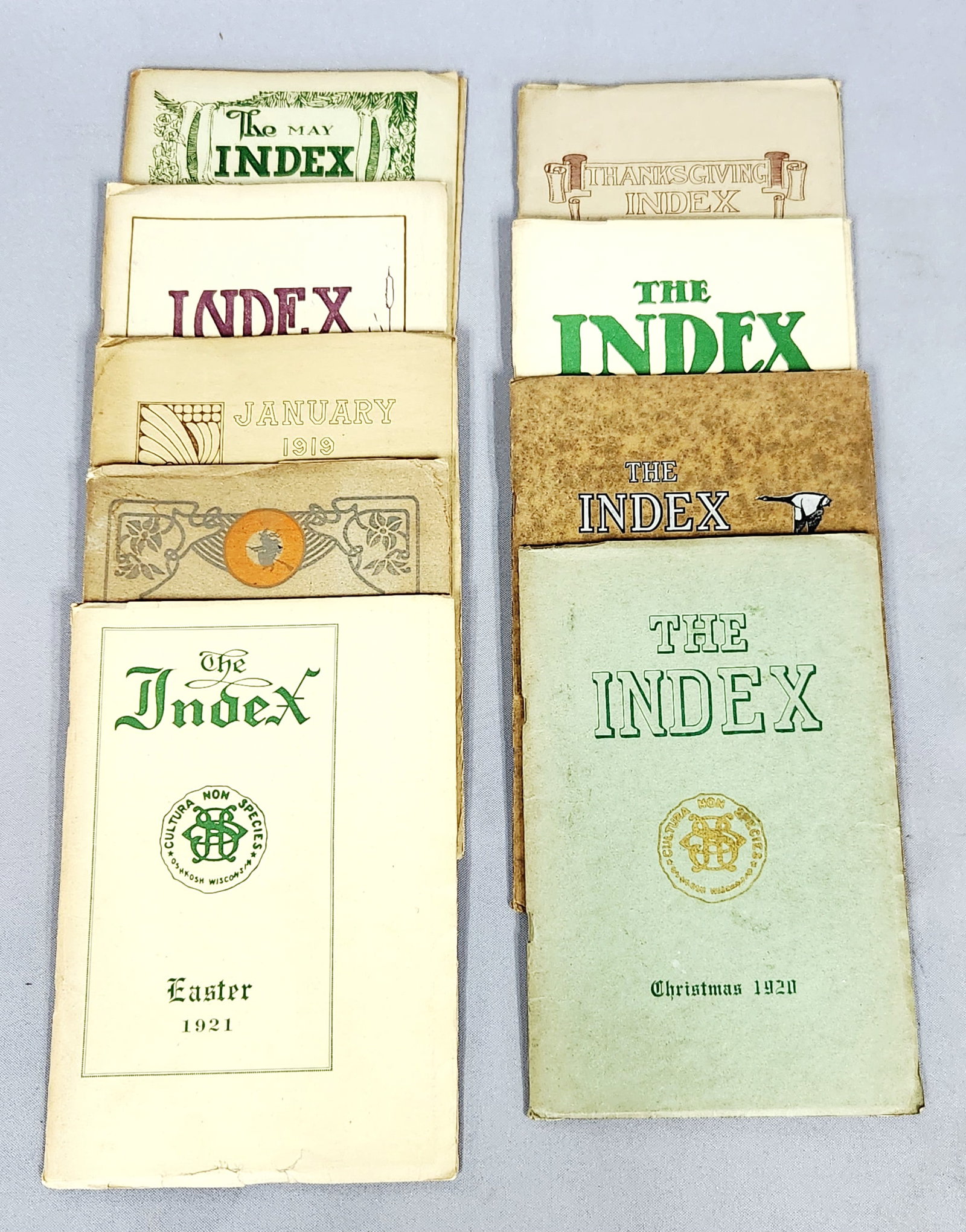 Oshkosh High School Index Yearbooks: This collection consists of ten issues of The Index, a student-led literary magazine and yearbook published by Oshkosh High School in Wisconsin between 1918 and 1922. These staple-bound softcover