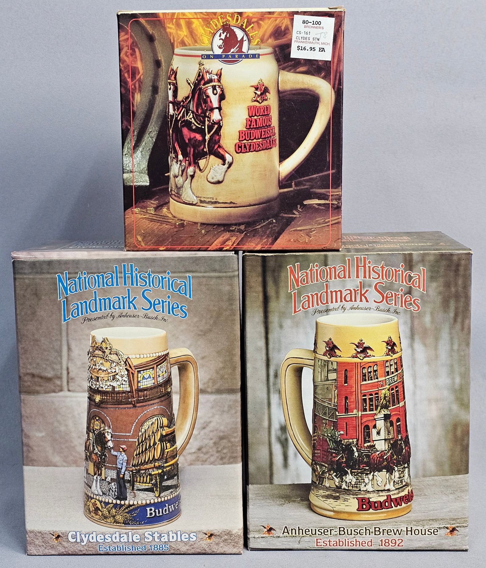 Three Budweiser National Landmark Steins: This collection contains three handcrafted stoneware relief steins produced by Ceramarte in Brazil for Anheuser-Busch. The set includes two designs from the National Historical Landmark Series along w