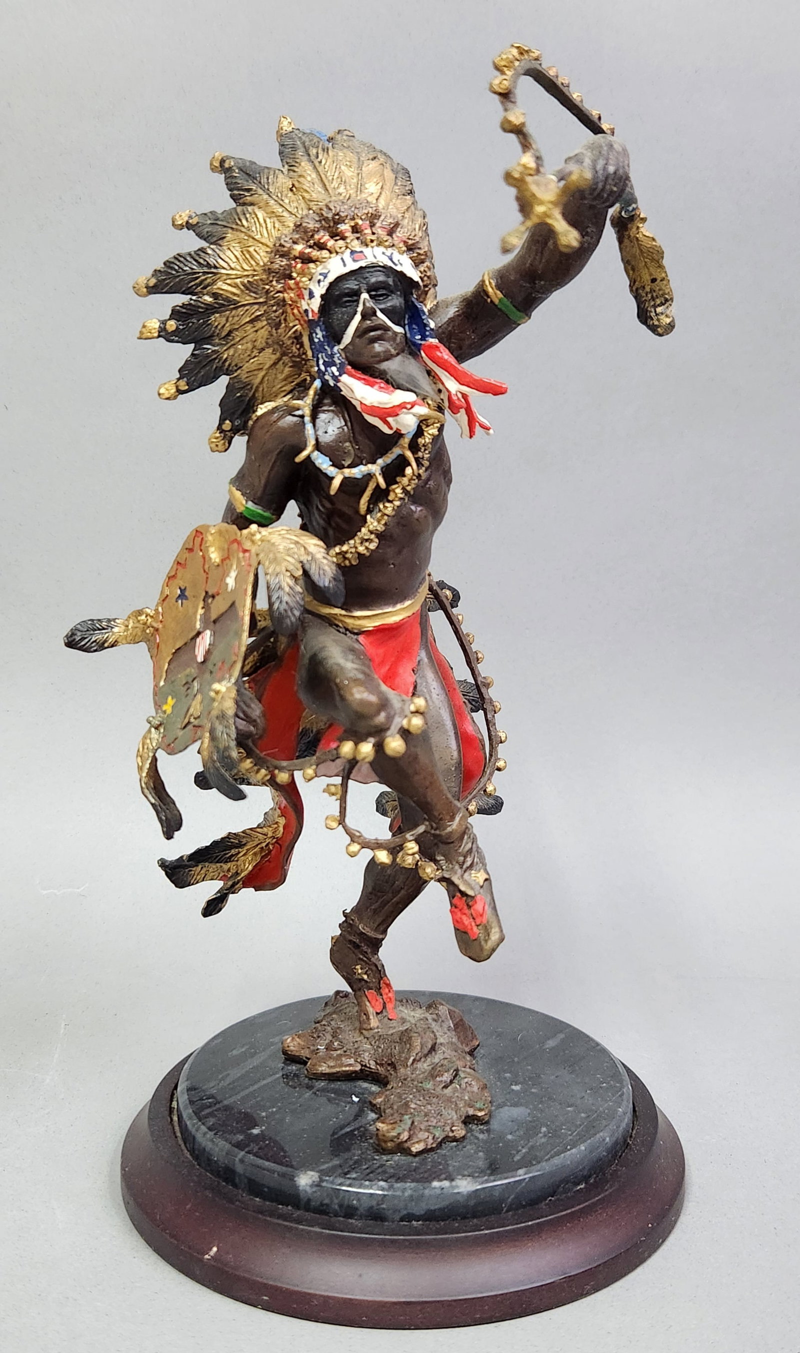 R. J. Murphy Spirit of the Thunderbird: This polychrome cold-painted metal sculpture by R. J. Murphy for the Franklin Mint depicts a Native American ceremonial dancer in a dynamic pose. Height: 11.75 inches The sculpture is in excellent