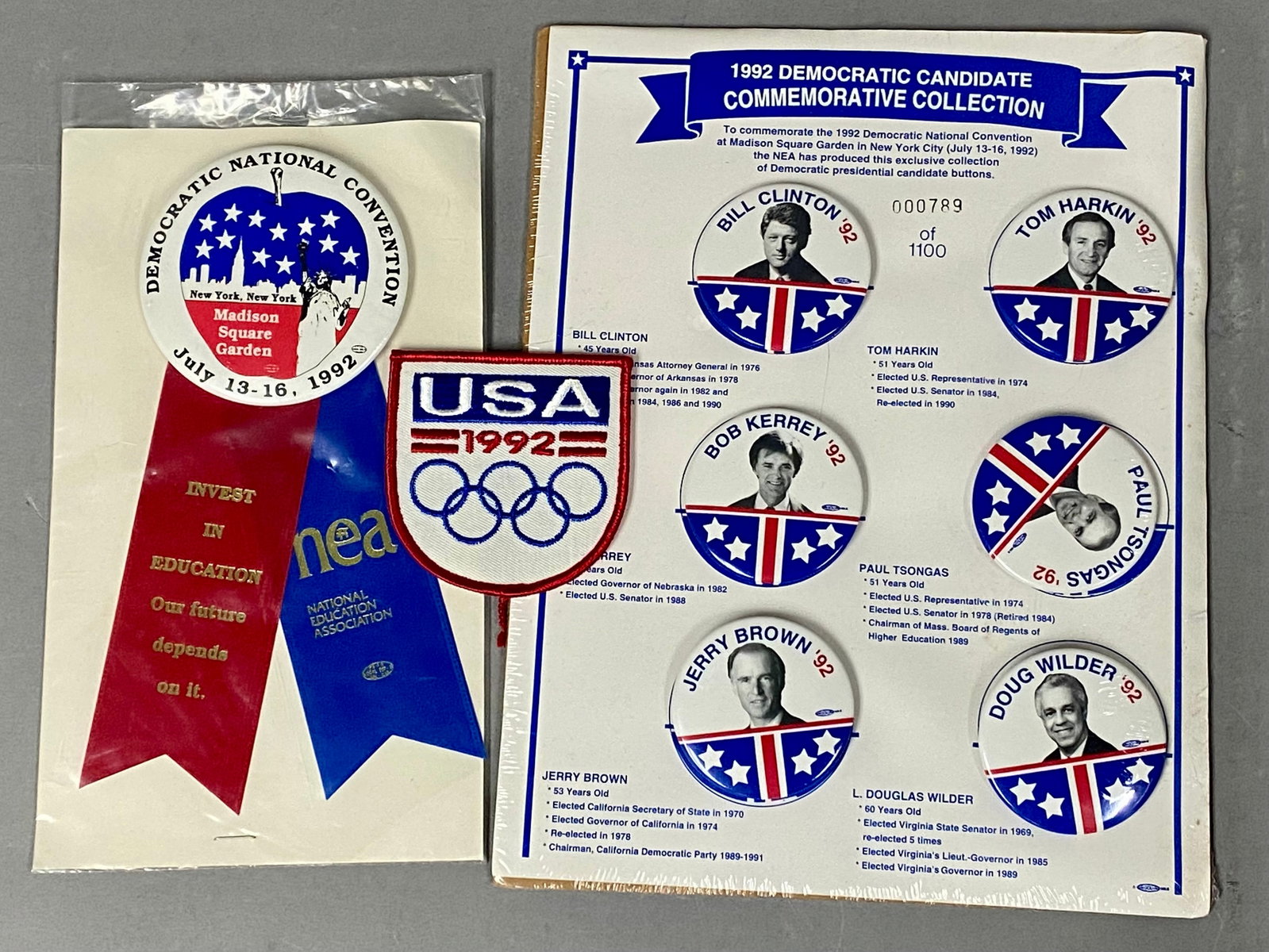 1992 DNC Commemorative Buttons & Financial Ephemera: An assortment of political memorabilia and vintage financial ephemera. The collection features a limited edition 1992 Democratic Candidate Commemorative Collection button set, produced by the National