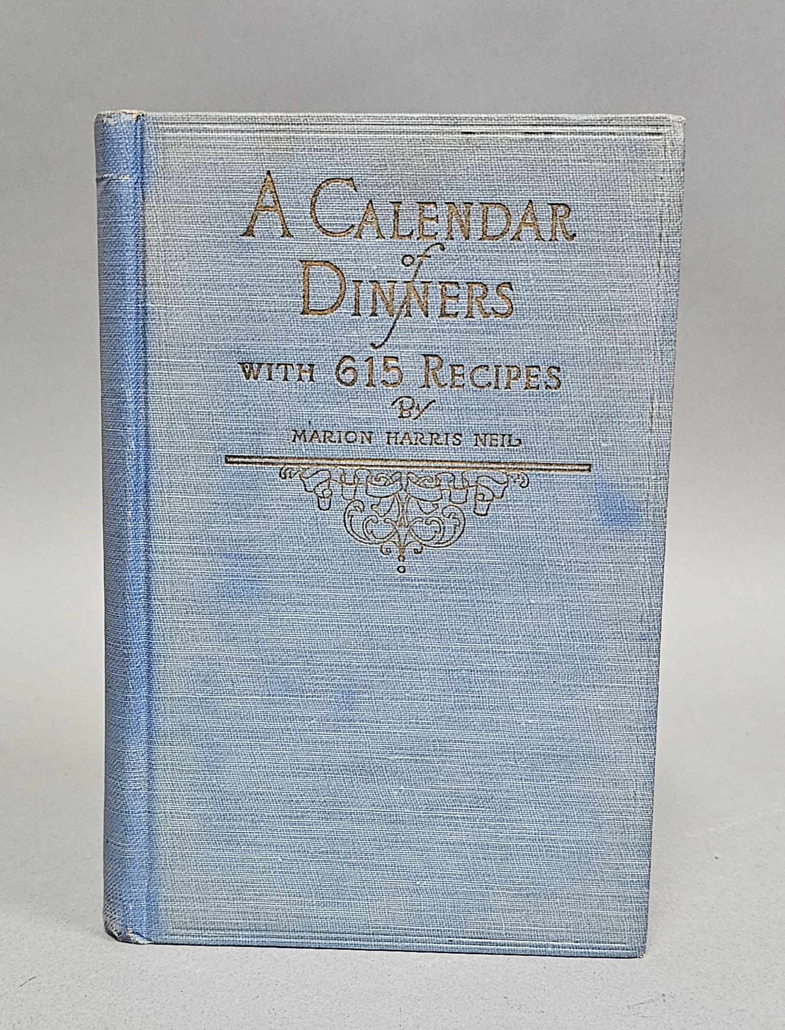 Neil A Calendar of Dinners Cookbook: This nineteenth edition hardcover copy of A Calendar of Dinners with 615 Recipes is authored by Marion Harris Neil and published by The Procter & Gamble Company of Cincinnati. Height: 7.5 inches The
