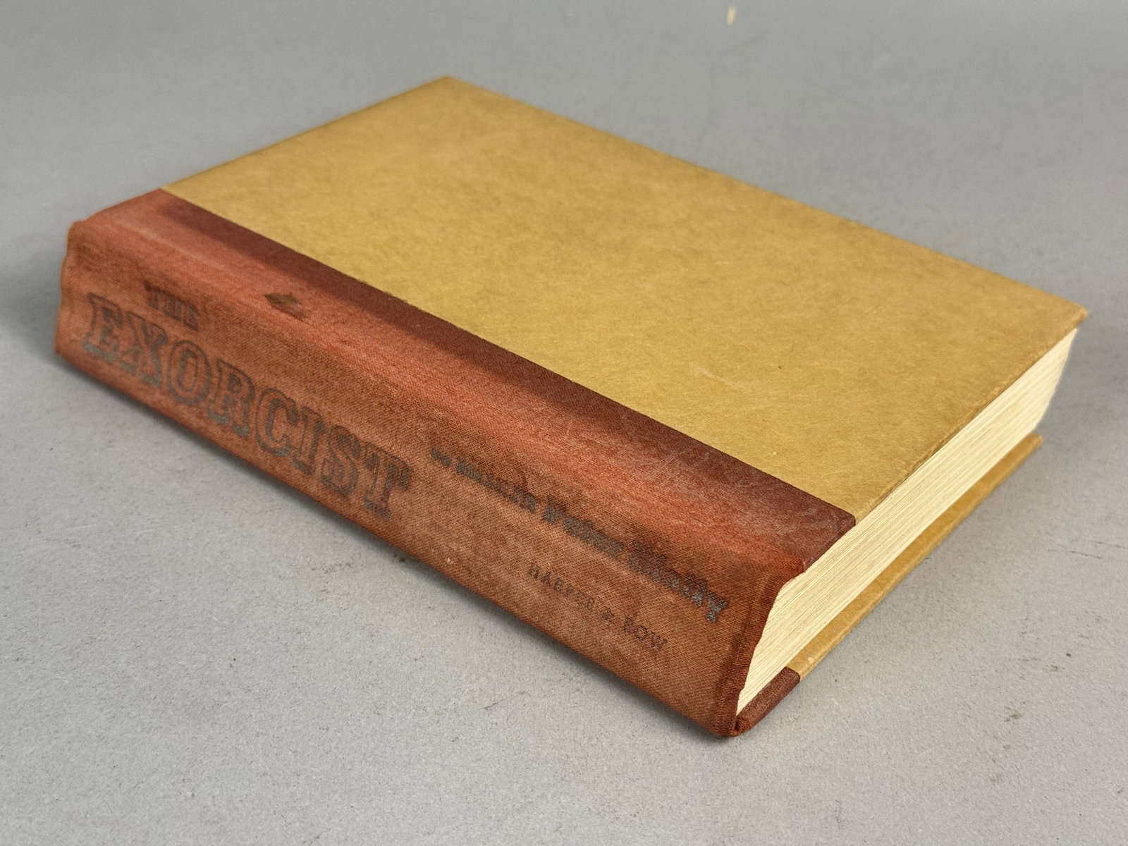 Blatty. The Exorcist. Harper & Row, 1971.: This volume is quarter-bound in reddish-brown cloth over tan boards with silver-stamped spine lettering. Published by Harper & Row missing the original dust jacket. Height: 8.5 inches Width: 5.75 inch