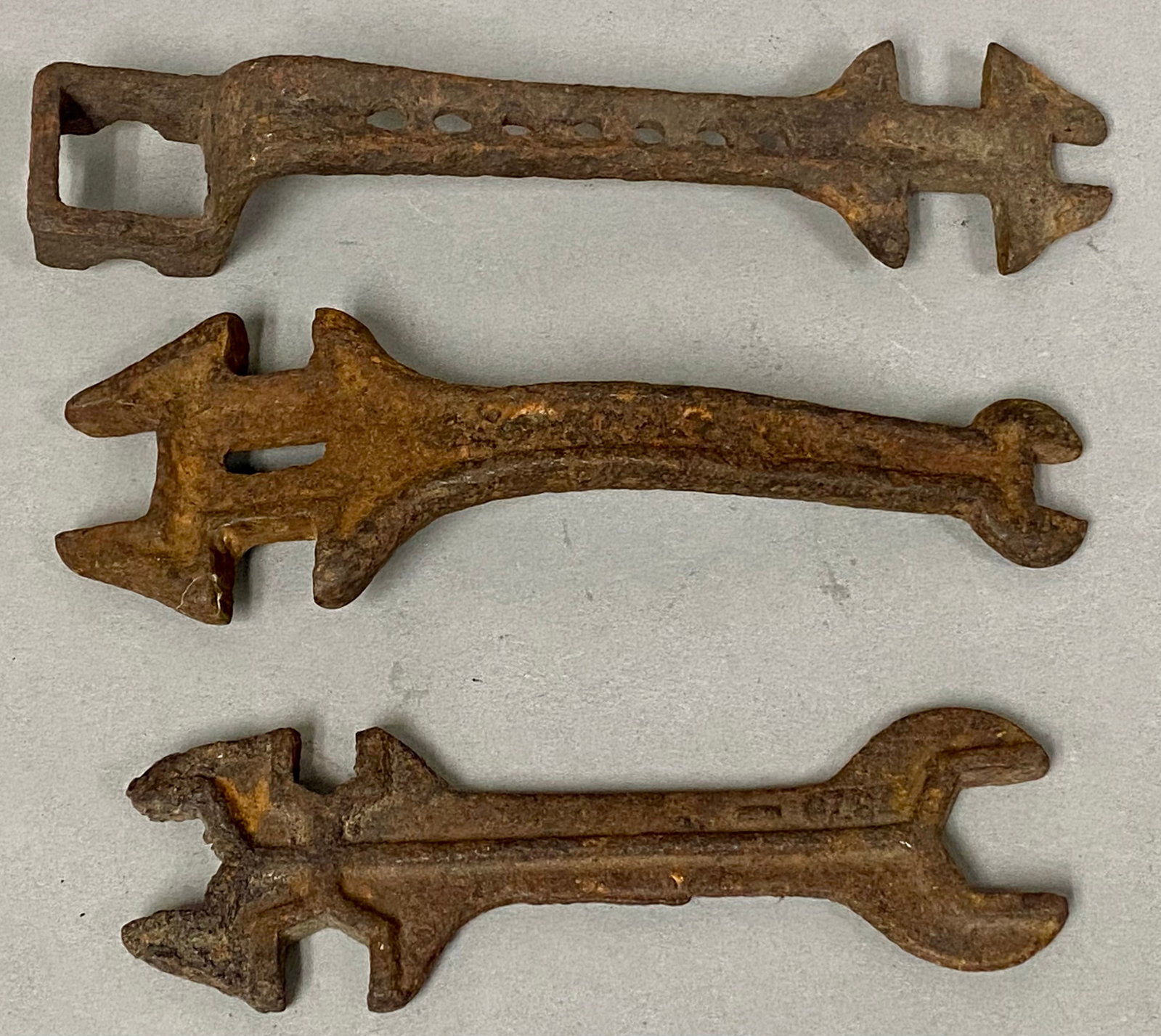 Trio of Antique Cast Iron Implement Wrenches (1 of 5)