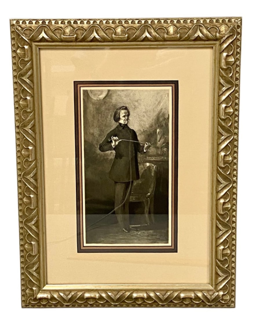 Paganini Oil Portrait Print: Framed print of Eugene Delacroix's 1831 oil portrait Paganini, depicting the legendary Italian violinist Niccolo Paganini holding a bow. The work is housed under glass in a decorative gilded wood