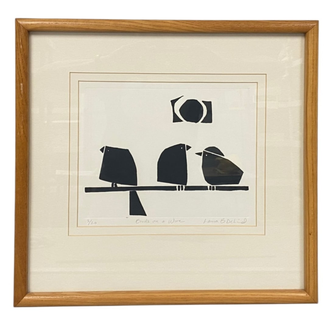 Laura B DeLind Linocut Birds on a Wire: This limited edition linocut by Laura B DeLind, titled Birds on a Wire, features a minimalist composition of three stylized birds in bold black ink. The work is numbered 3/20, titled, and signed in pe