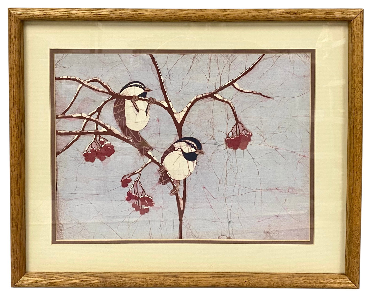 Pat Rutledge 'Winter Chickadees' Batik (Signed): This batik textile by Pat Rutledge, titled 'Winter Chickadees,' features two birds perched on snow-covered branches with red berries. The composition utilizes traditional wax-resist techniques to crea