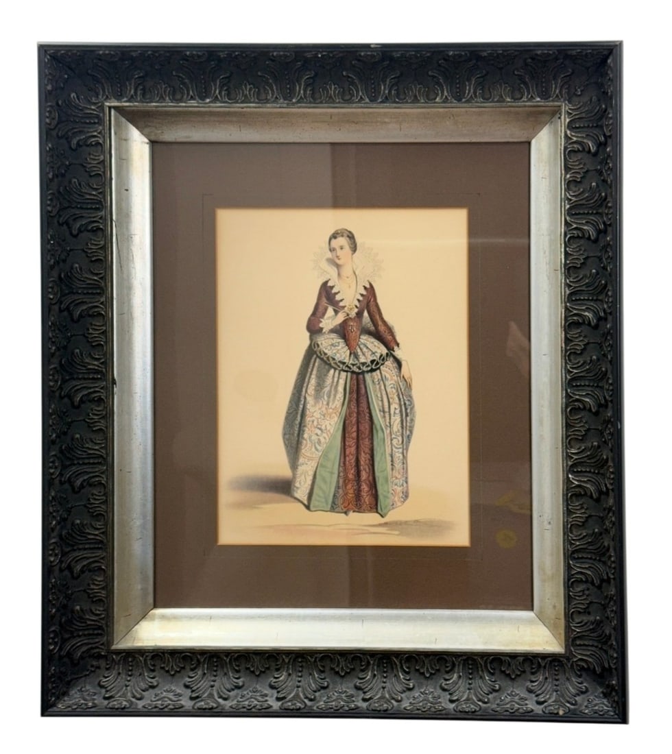'Henri IV Costume' Reproduction Print: This reproduction lithograph print, attributed to Achille Deveria, depicts a noblewoman in historical dress from the era of Henri IV. The work features elaborate hand-coloring on a patterned