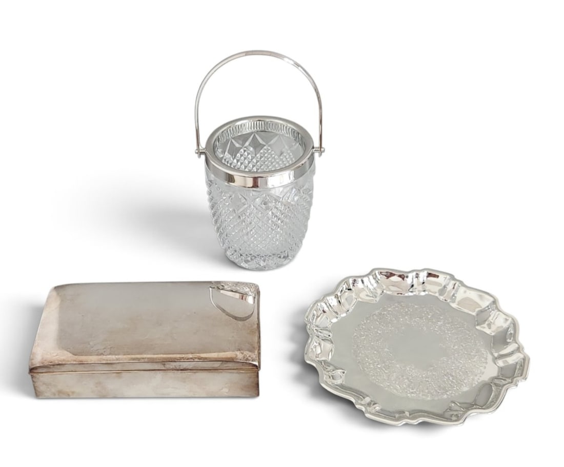 Silver-Plated Table Accessories: This lot features a cedar-lined cigarette box by Poole Silver Company, stamped EPCA POOLE SILVER CO 1899 and featuring a script monogrammed lid. Cigarette box: 6.25 inches length Tray: 6 inches