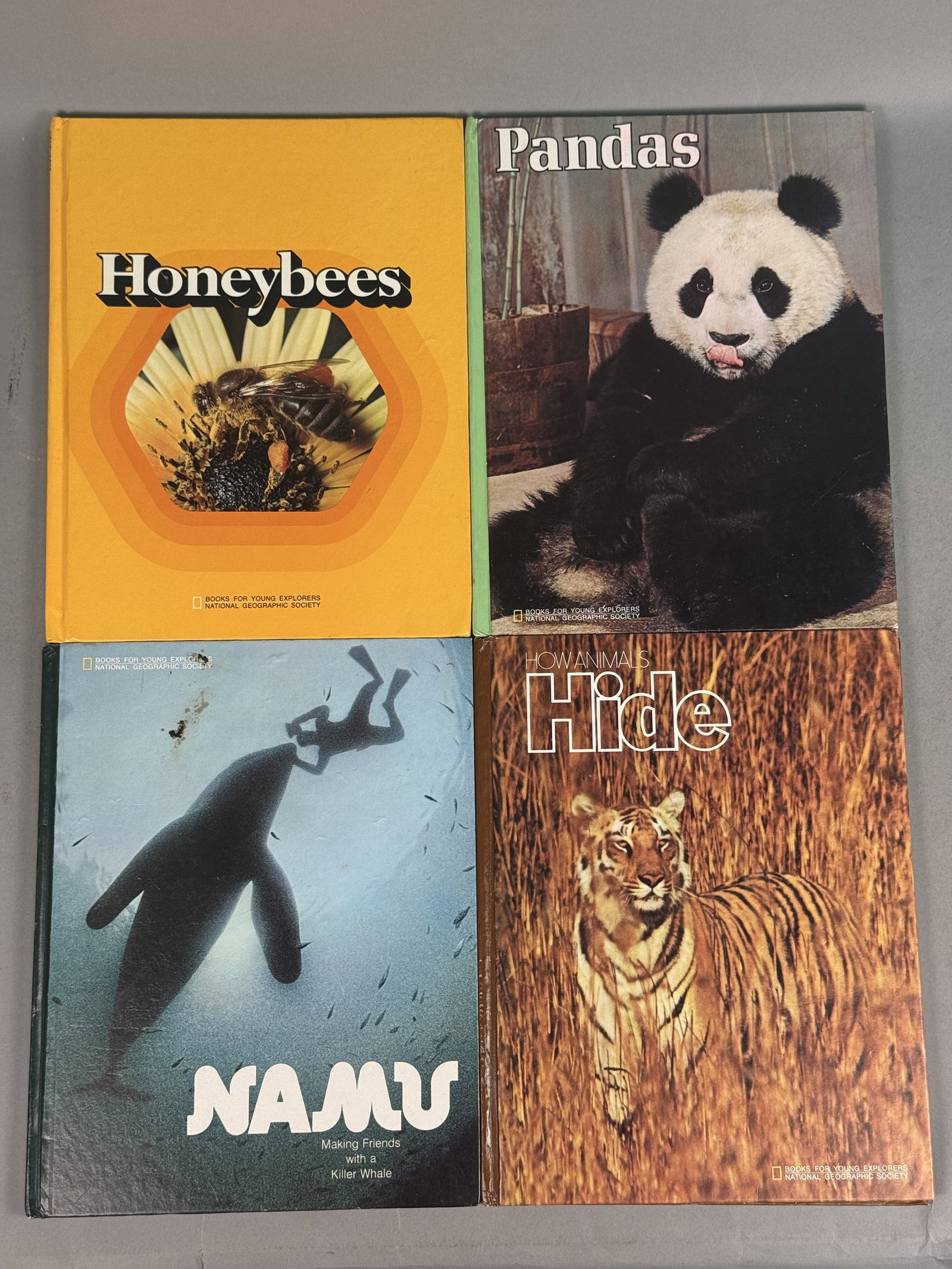 National Geographic Society 1973 Young Explorers Books: A group of four vintage children's nature books from the Books for Young Explorers series published by the National Geographic Society. All volumes in this lot carry a 1973 copyright date and feature